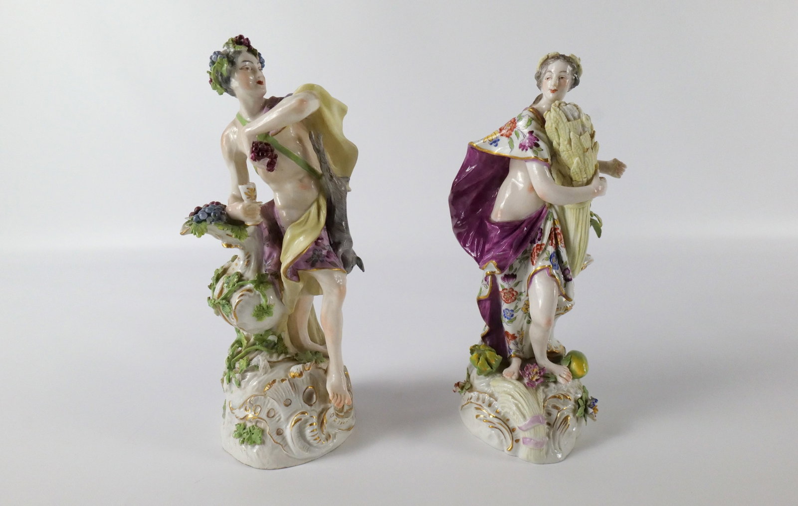 Pair of 19th Century Meissen Hand Painted Porcelain Figurines: Pair of 19th Century Meissen Hand Painted Porcelain Figurines. Including Autumn and Summer. Autumn has some chipping to leaves of the crown and chipping to leaves. Summer is missing something from her