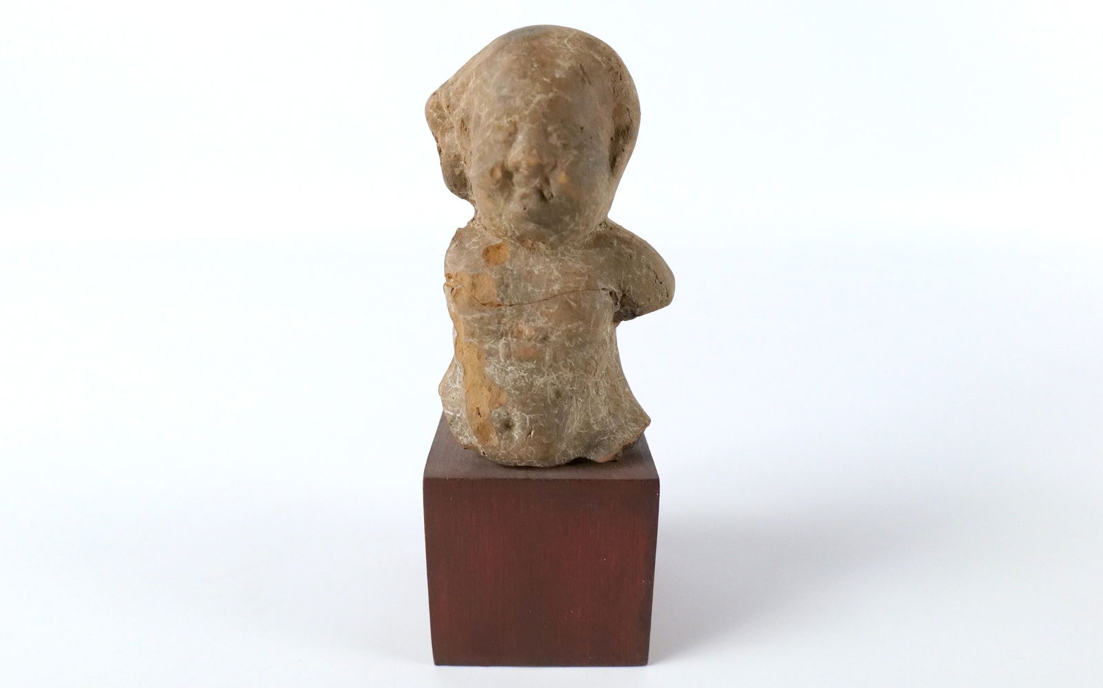 Antique Terra Cotta Asian Remnant of Figure on Stand: Antique Terra Cotta Asian Remnant of Figure on Stand. Measures 5.75" tall. All invoices must be paid within 24 hours of the sale. We offer multiple shipping options, please read the shipping terms to