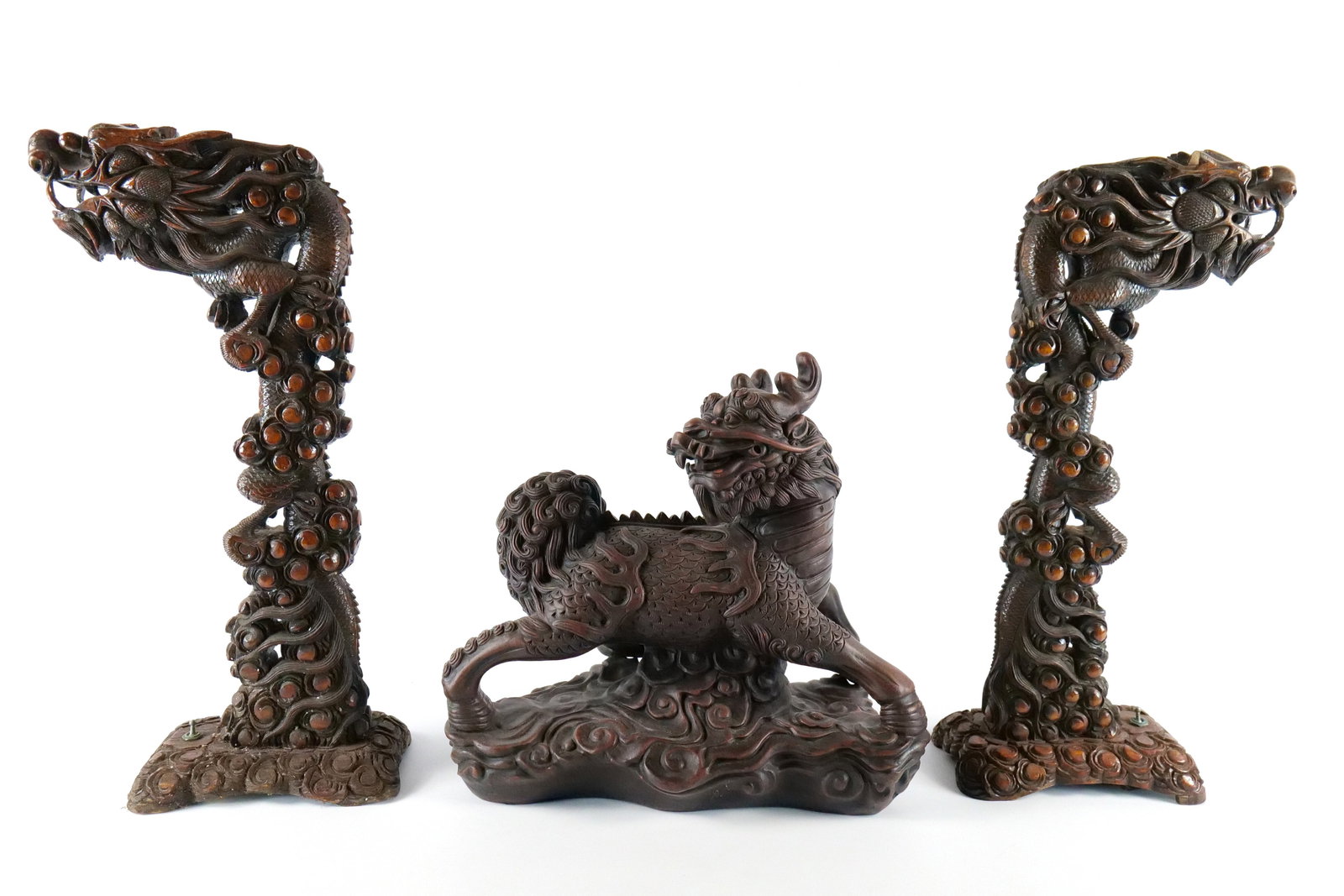 Group Lot of Asian Influenced Items: Group Lot of Asian Influenced Items. Including Pair of Hand Carved Decorative Lamps - Chips and One missing eye and other missing part of dragons ear and Chalkware Oversized Foo Dog - Has been repaire