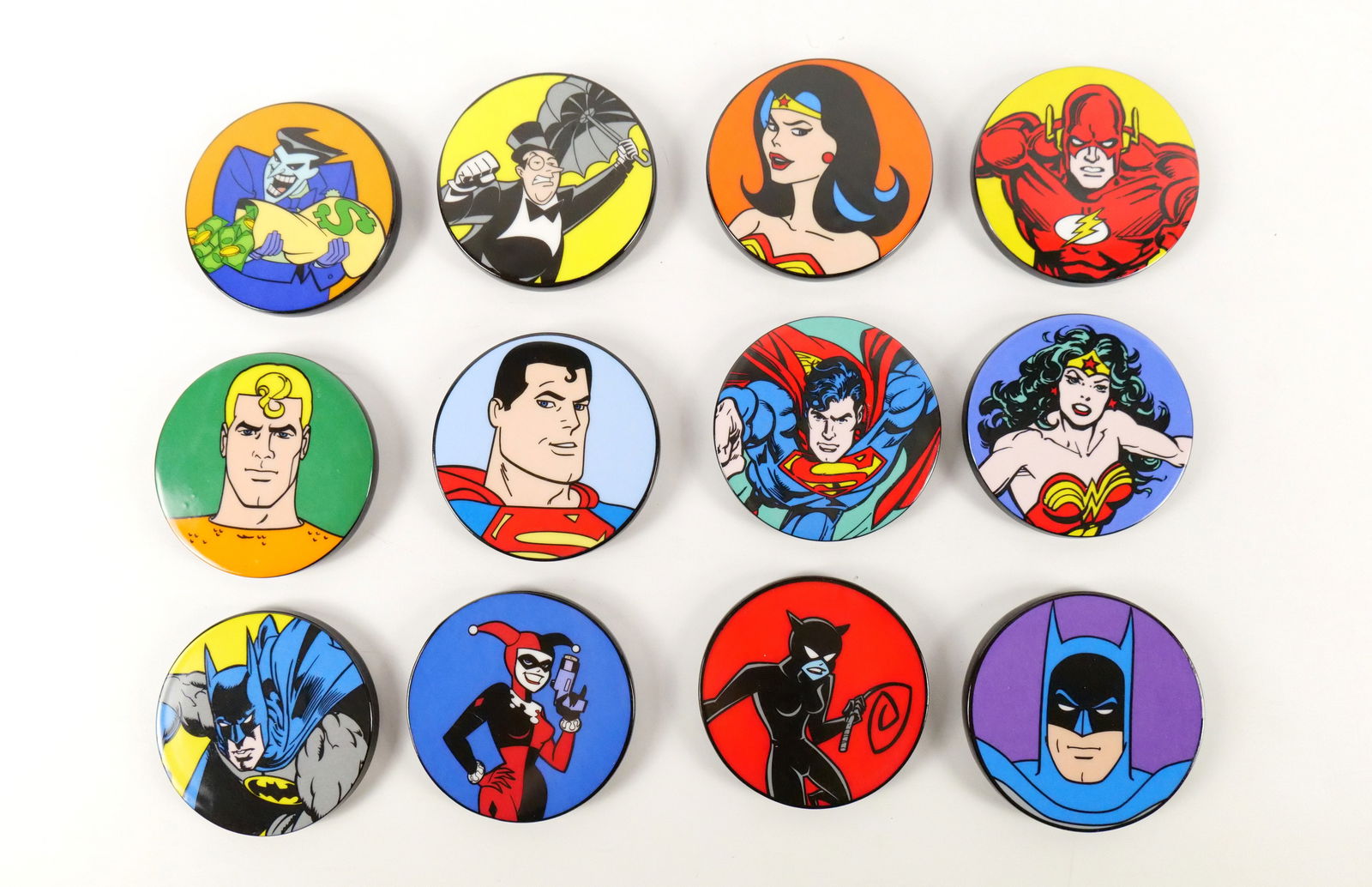 Set of 12 DC Comics Wall Coasters: Set of 12 DC Comics Wall Coasters. Including Various Wonder Woman's, Batman's, Superman's, Harley Quinn, The Joker, Catwoman, AND more. All invoices must be paid within 24 hours of the sale. We offer