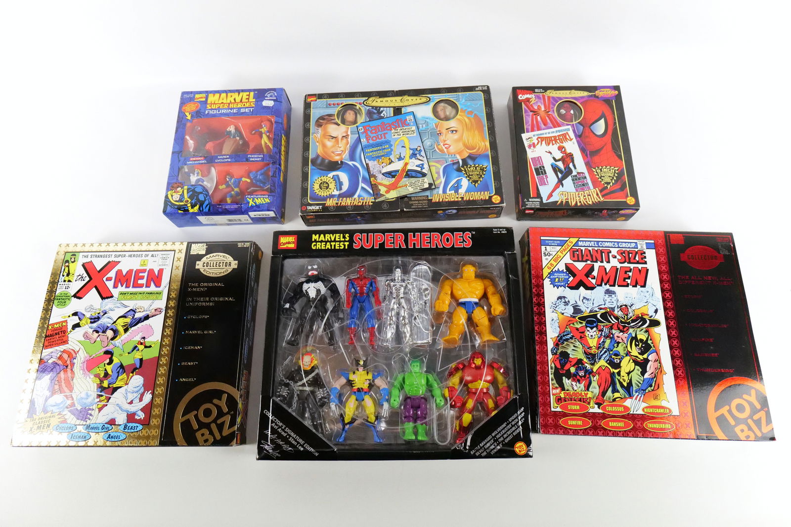 Group Lot of Marvel Action Figures: Group Lot of Marvel Action Figures. Including Toy Biz X-Men Collector's Sets, Marvel's Greatest Super Heroes Sets, and Toy Biz Famous Covers (Mr. Fantastic/Invisible Girl, and Spider-Girl). All new in