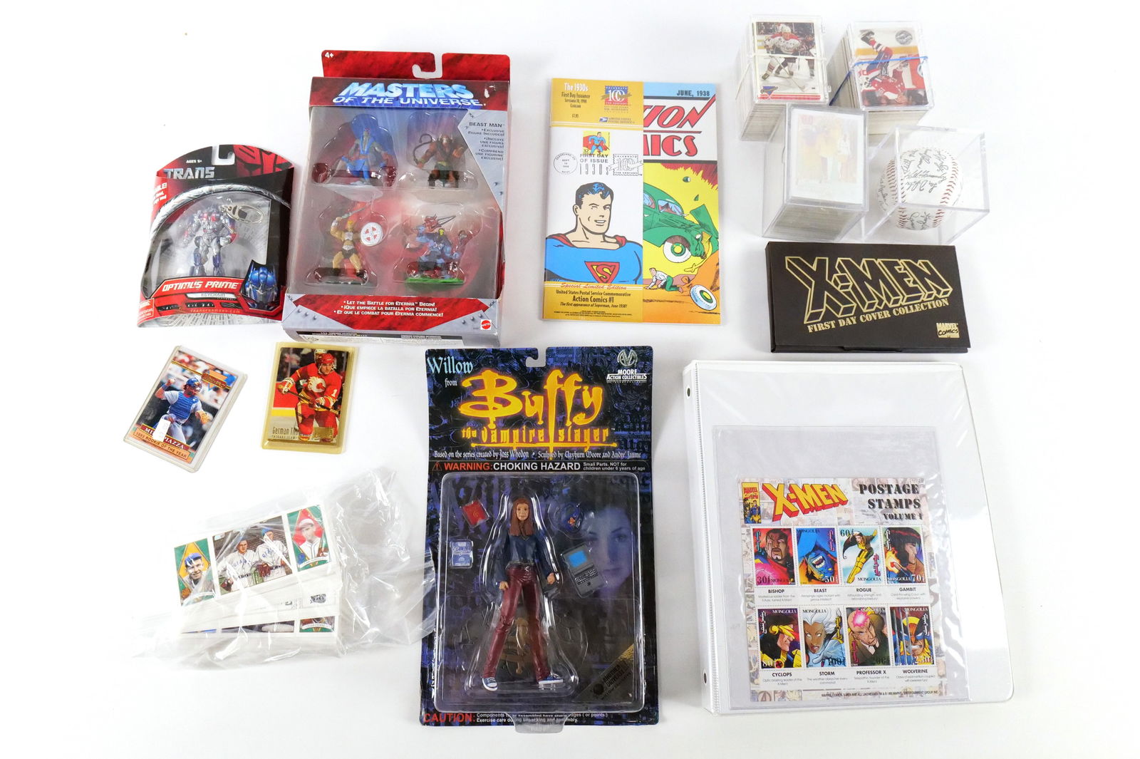 Lot of Mixed Collectibles: Lot of Mixed Collectibles. Including Sports Cards, Buffy Willow Action Figures, Masters of the Universe Toys, X-Men First Day Covers and Stamps, Sports Cards and More. All invoices must be paid within