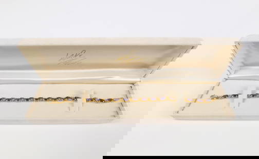 14K Gold and Tanzanite Bracelet: 14K Gold and Tanzanite Bracelet. The lot includes a Mexican made 14K yellow gold bracelet featuring alternating 5.5mm x 4mm