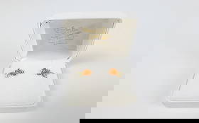 10K Gold Rose Stud Earrings: 10K Gold Rose Stud Earrings. The lot includes a pair of 10K gold stud earrings by Black Hills Gold in the form of a rose gold rose with yellow gold leaves. The earrings measure .56'' long by .32'' wid