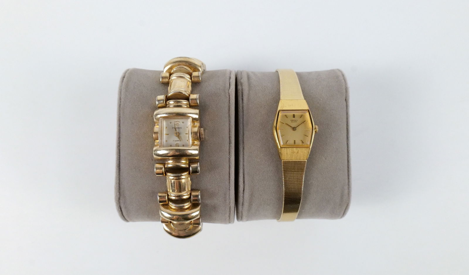 Pair of Vintage Ladies Gold Plated and Gold Filled Watches: Pair of Vintage Ladies Gold Plated and Gold Filled Watches. The lot includes a pair of vintage ladies watches. Featuring a gold plated ladies quartz watch by Seiko (2C20-5790, 497215) with a hexagonal