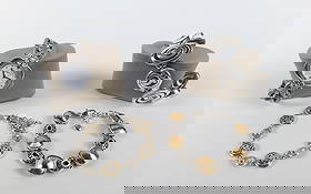 Lot of Brighton Jewelry: Lot of Brighton Jewelry. Including Watch with Rhinestones - Working - measuring 6.5", Chunky Bracelet with Swirl Oval Designs measuring 7", Bracelet with Gold Tone Accented Circular Designs measuring