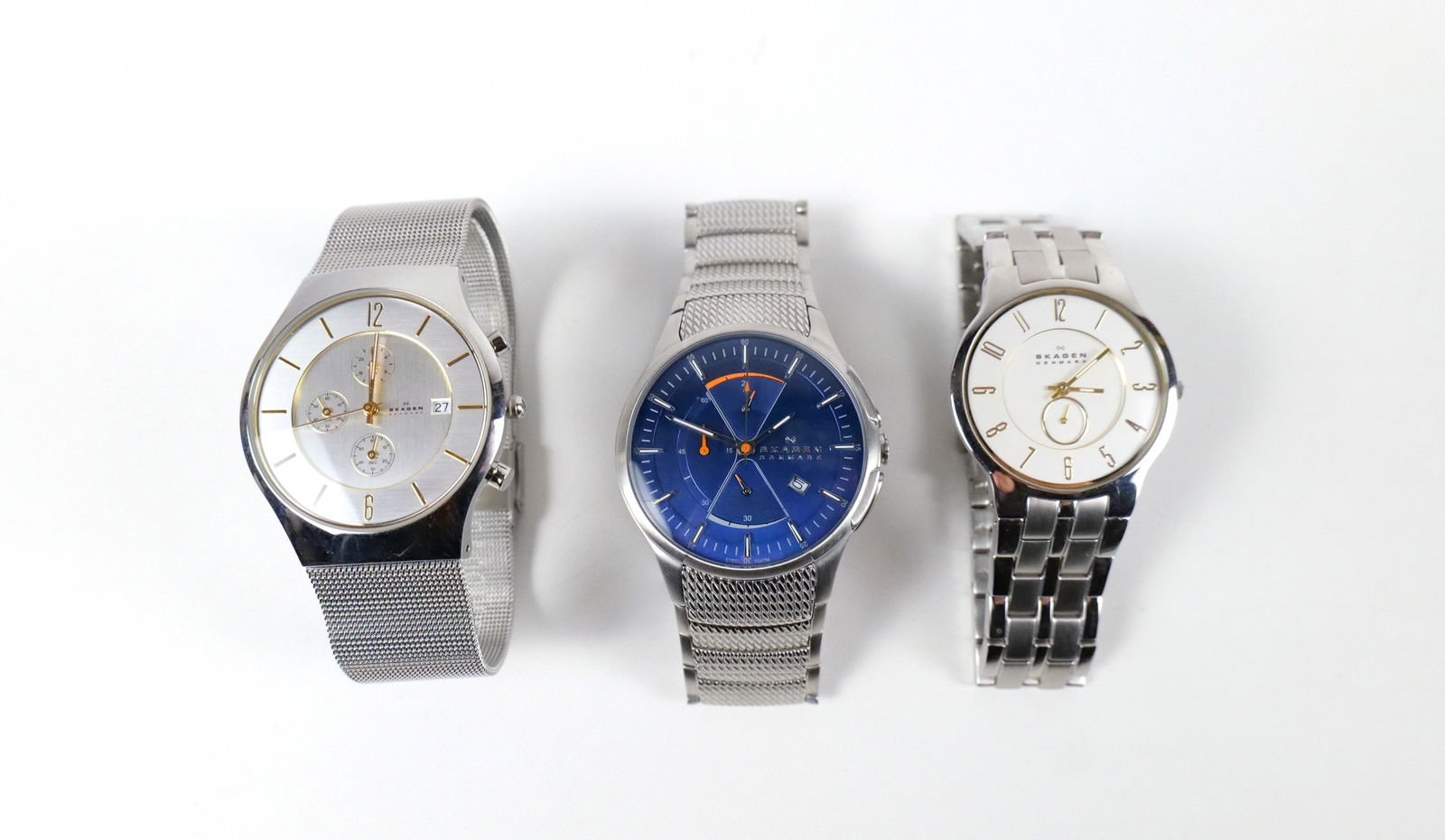 Lot of 3 Skagen Denmark Men's Wristwatches: Lot of 3 Skagen Denmark Men's Wristwatches. Includes Anchor Chronograph Serial 745XLSXN, Chronograph with Stainless Mesh Band - 4 Hands, and Other has Second Hand - Serial 433LSGX. All invoices must b