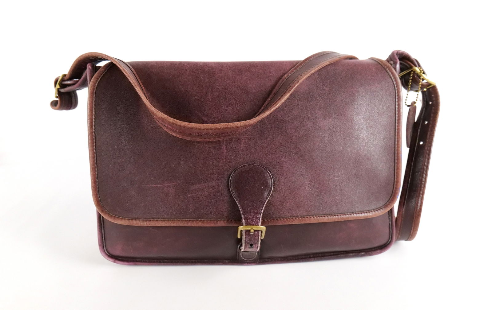 Vintage Burgandy Leather Letter Brief: Vintage Burgundy Leather Letter Brief. In Heavily Used Condition with apparent scuffs and scratches. Measures 9.5" tall x 14" wide. All invoices must be paid within 24 hours of the sale. We offer mult