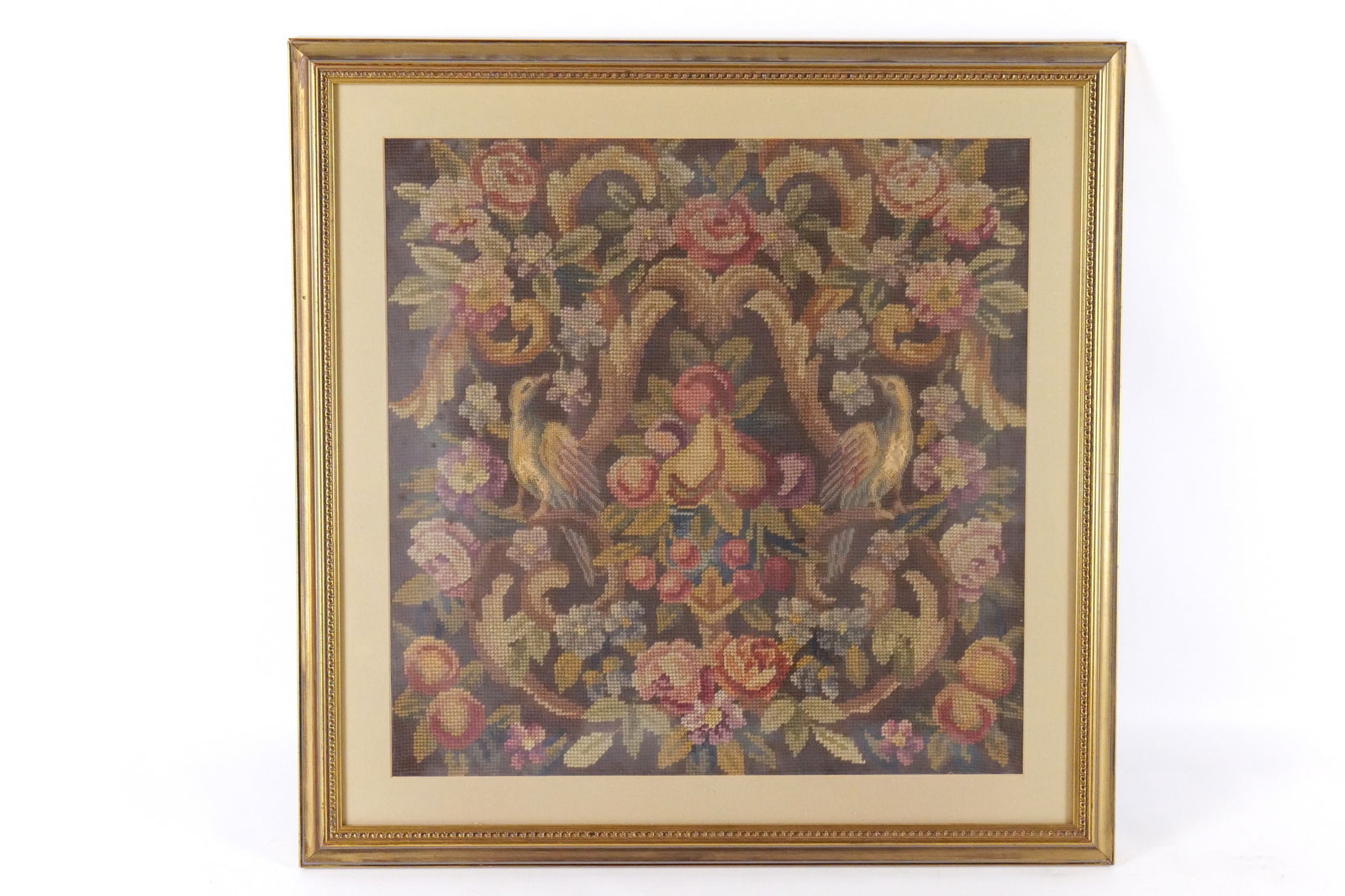 Antique Needlepoint by Agnes Bayer Raabe: Antique Needlepoint by Agnes Bayer Raabe (1872-1945). Depicting Fruit, Flowers and Birds. Has some tears in birds. Measures 23" tall x 23" wide. All invoices must be paid within 24 hours of the sale.