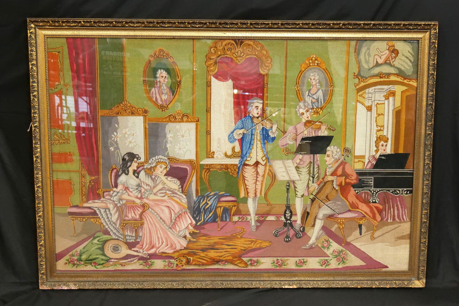 Framed Oversized Needlepoint: Framed Oversized Needlepoint depicting a French Musical scene. Measures 24.5 inches tall by 66 inches long, needs to be reattached to the frame, frame as found. All invoices must be paid within 24 hou