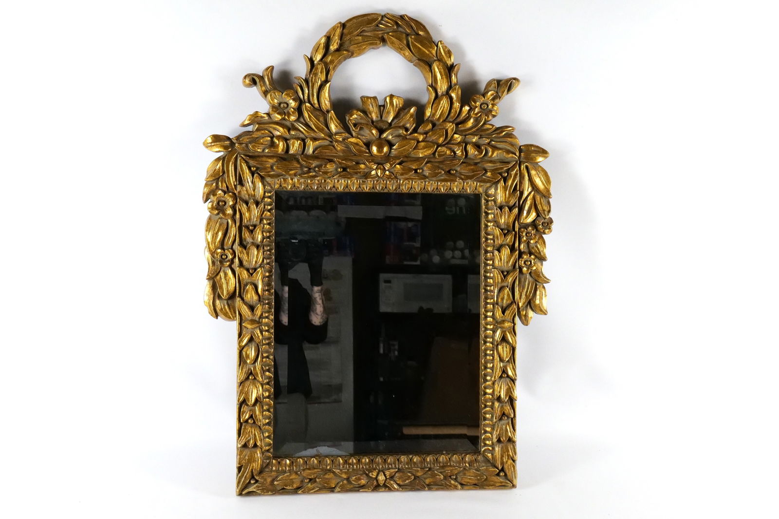 Carved Gold Gilded Mirror: Carved Gold Gilded Mirror with a beveled edge. Measures 35 inches tall by 25.5 inches wide. All invoices must be paid within 24 hours of the sale. We offer multiple shipping options, please read the s