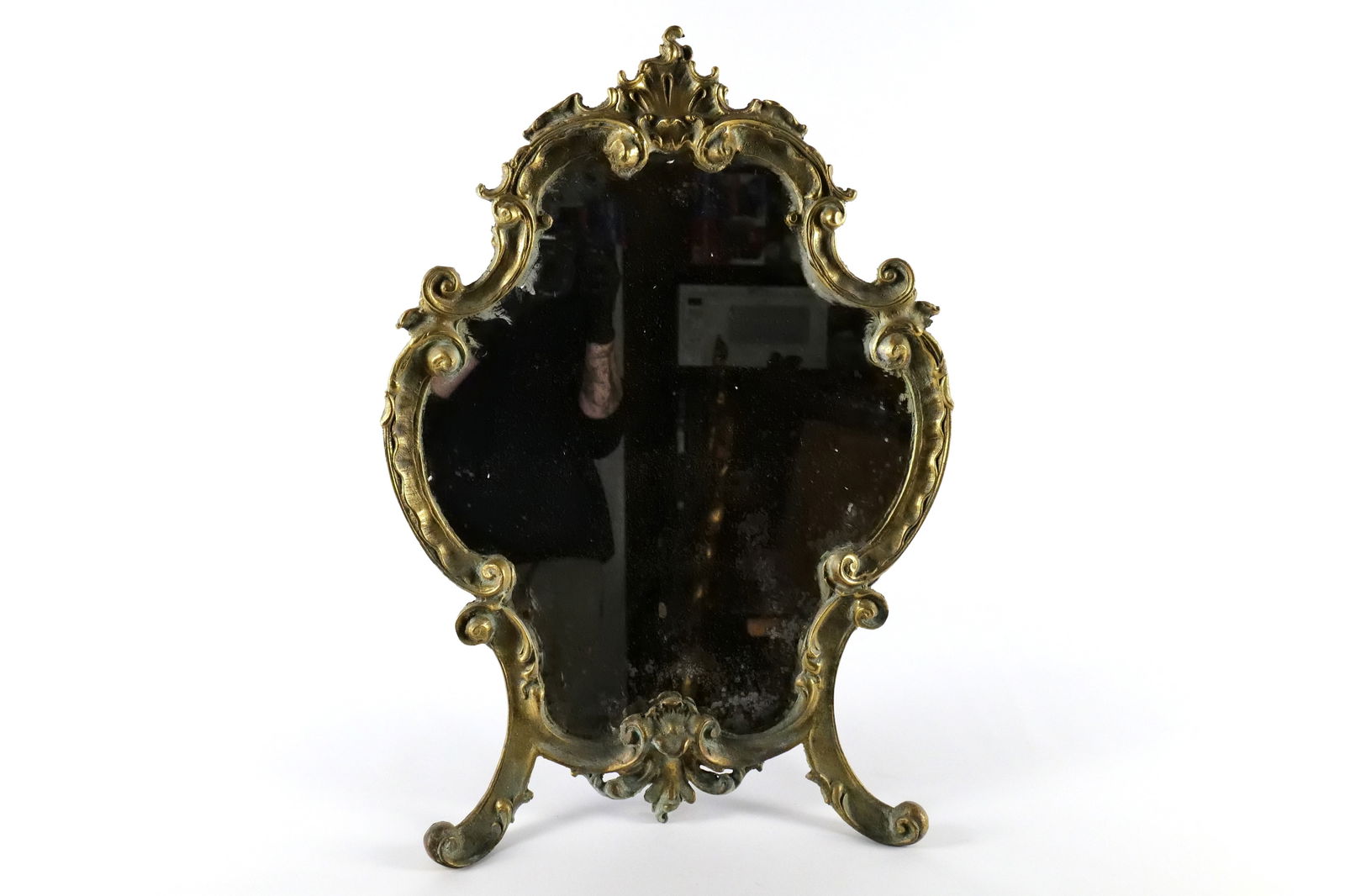 Brass Vanity Mirror: Brass Vanity Mirror with a-frame stand. Measures 24 inches tall by 18 inches wide, mirror needs to be re-mirrored. All invoices must be paid within 24 hours of the sale. We offer multiple shipping opt