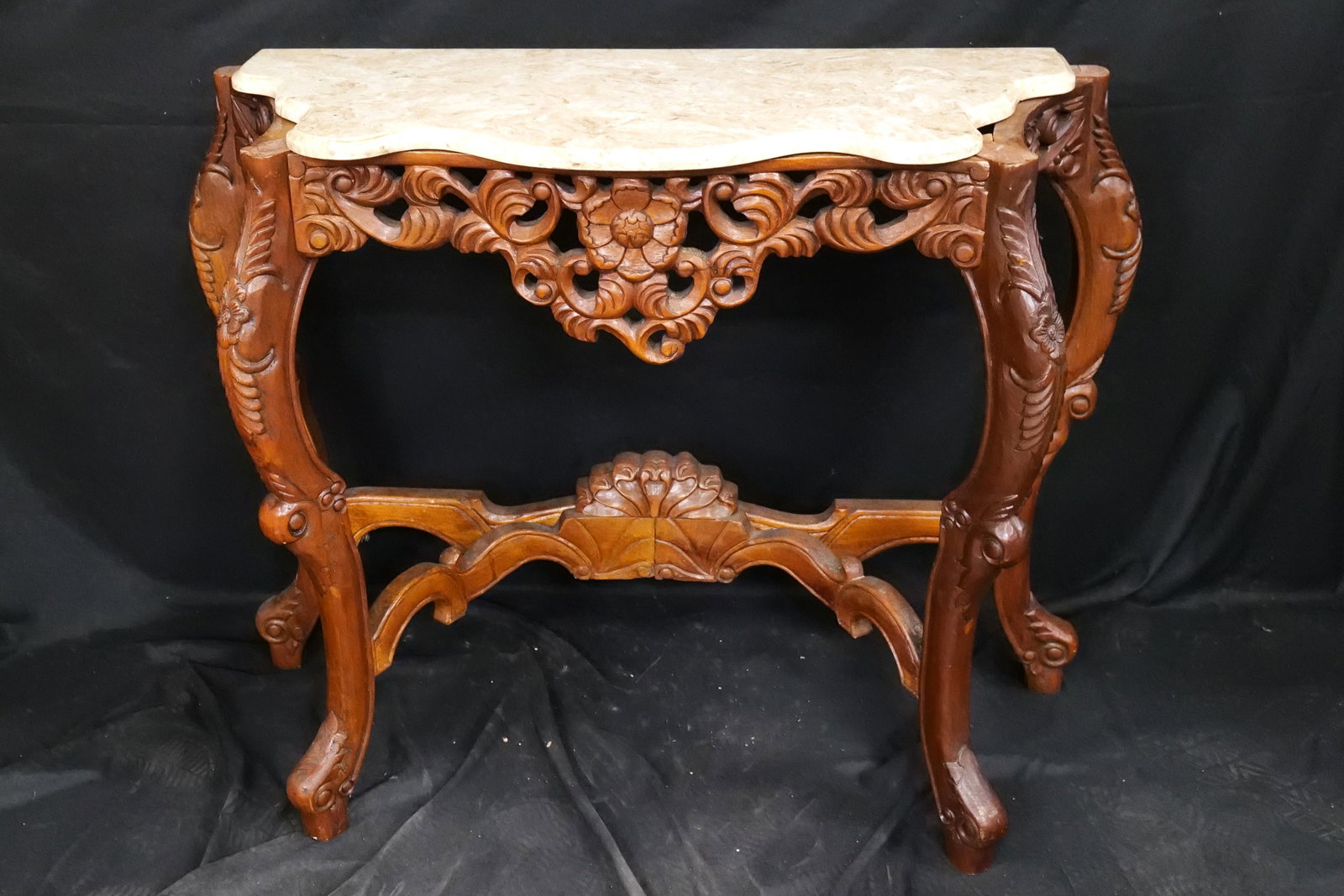 Marble Topped Oriental Style Carved Console Table: Marble Topped Oriental Style carved console table. Measures 33 inches tall by 39 inches long by 15 inches wide, marble does not fit the top but works...kind of. All invoices must be paid within 24 hou