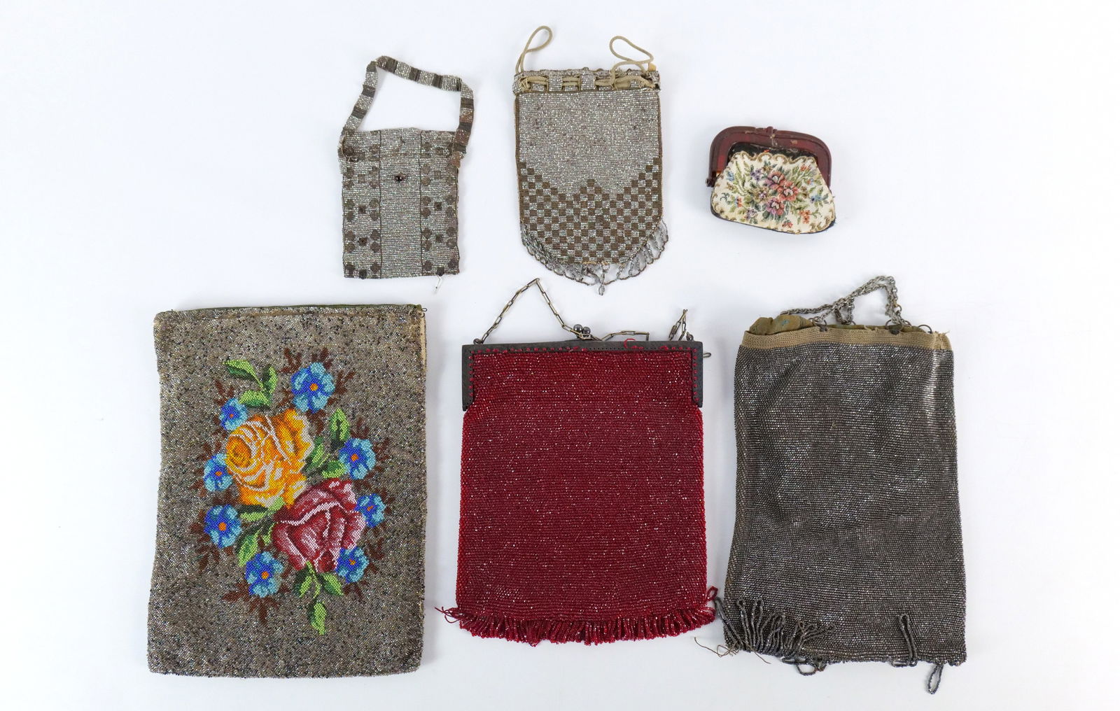 Lot of Vintage Beaded Purses and Petit Point Coin Purse: Lot of Vintage Beaded Purses and Petit Point Coin Purse. Some made with cut steel beads. Condition Issues Present - Loose Stitching, Missing some beads, and small tears. Largest measures 10.5" x 7.75"