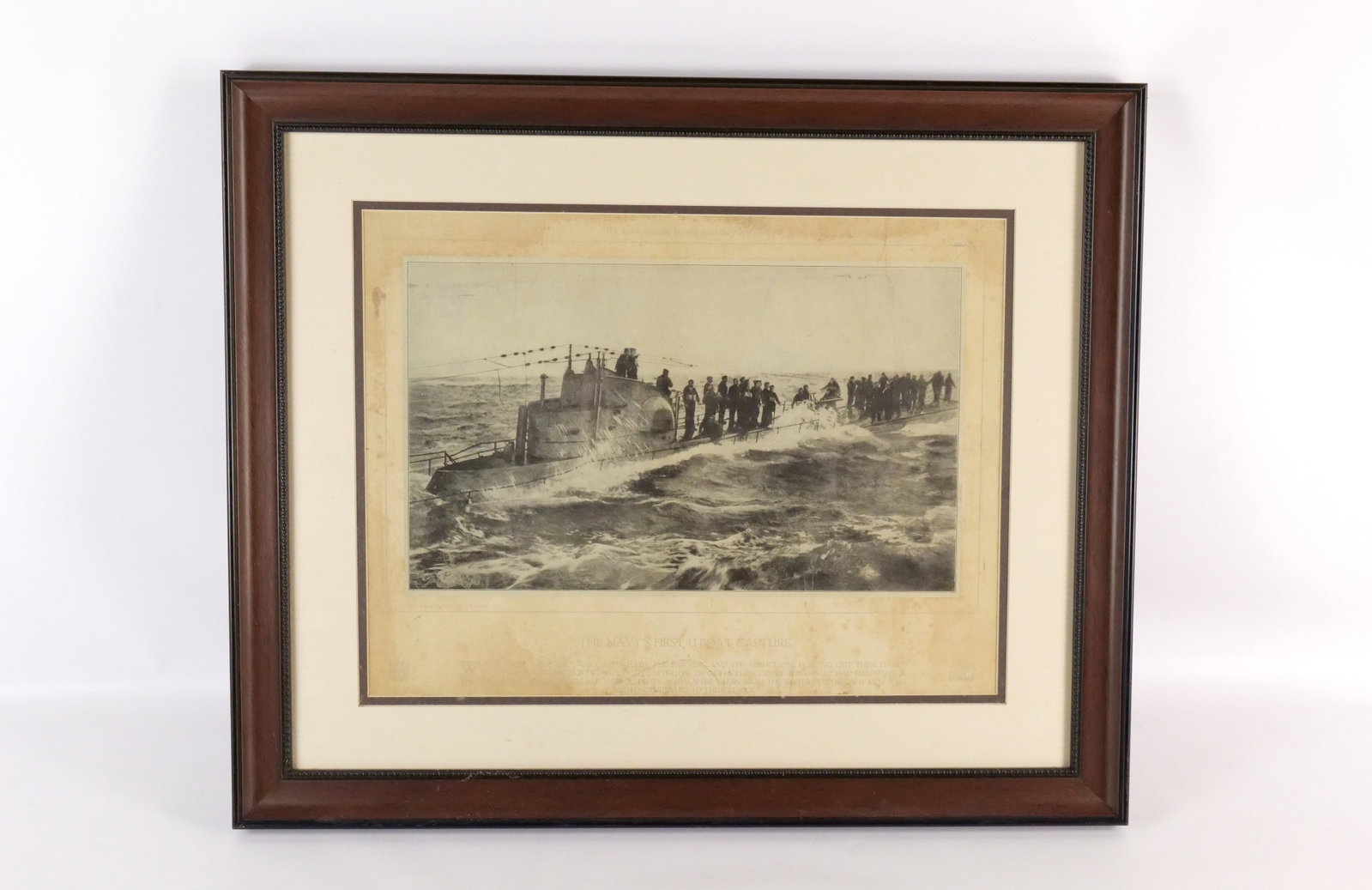 Framed Print of Navy's 1st U Boat Capture: Framed Print of Navy's 1st U Boat Capture. Staining, Creasing and Tears Present. Measures 20" tall x 24" wide. All invoices must be paid within 24 hours of the sale. We offer multiple shipping options