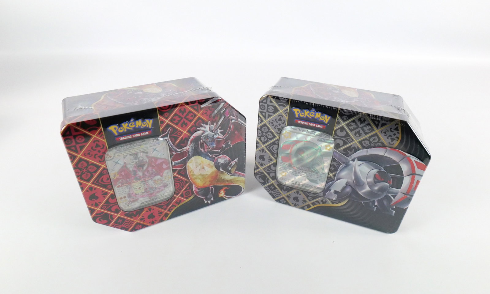 Lot of 2 Pokémon Trading Card Game Collectible Sealed Tins: Lot of 2 Pokémon Trading Card Game Sealed Collectible Tins. Including Scarlet & Violet Paldean Fates Charizard and Iron Treads. All invoices must be paid within 24 hours of the sale. We offer multipl