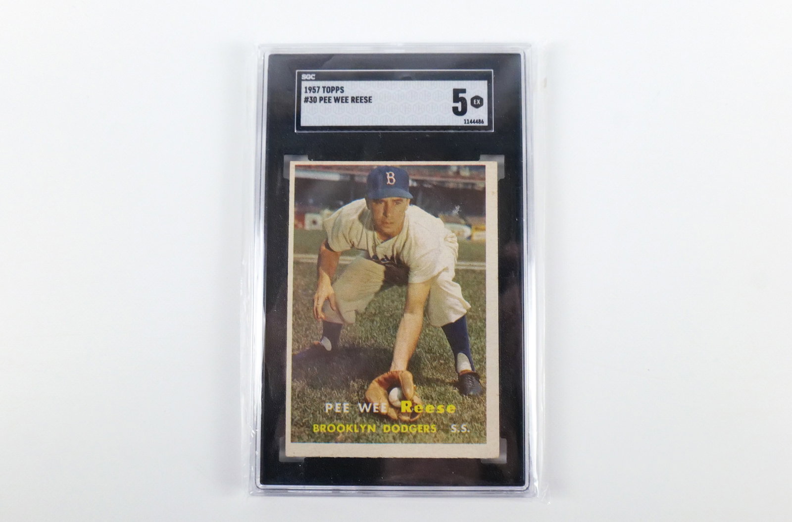 Topps 1957 Pee Wee Reese #30 SGC 5.0: Topps 1957 Pee Wee Reese #30 - SGC Graded 5.0 EX. All invoices must be paid within 24 hours of the sale. We offer multiple shipping options, please read the shipping terms to understand your options. 