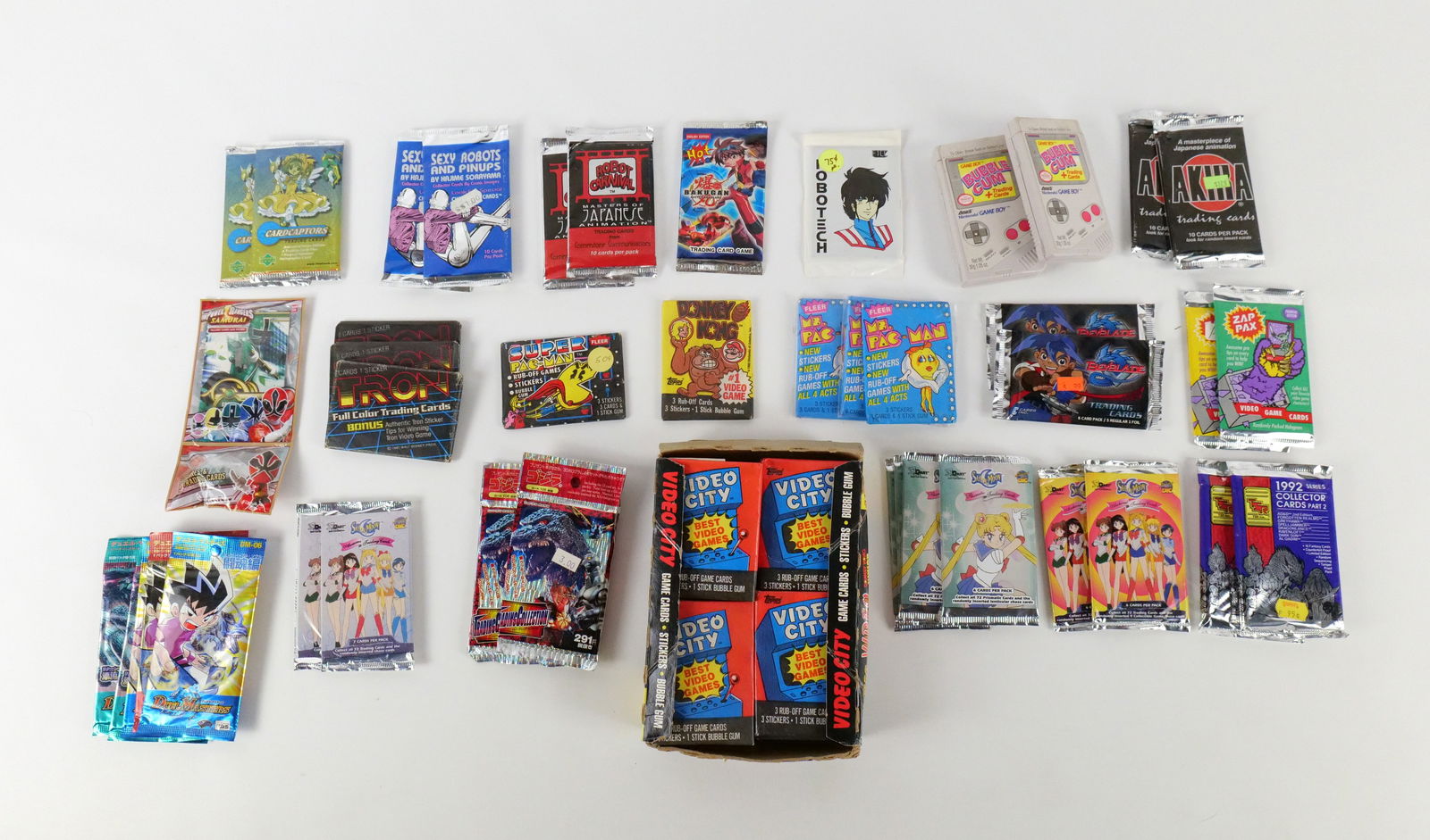 Group Lot of Video Game and Japanese Trading Card Sealed Packs (1 of 8)