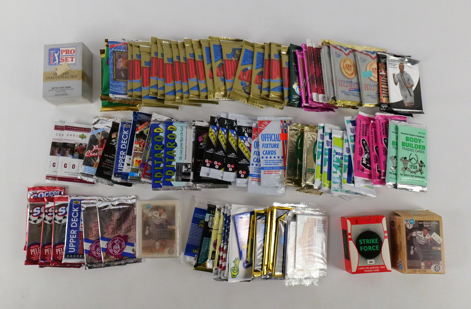 Lot of Mixed Sports Sealed Trading Cards: Lot of Mixed Sports Sealed Trading Cards. Including Hockey, Boxing, Golf, Soccer, Olympics, Bowling, and More. All invoices must be paid within 24 hours of the sale. We offer multiple shipping options