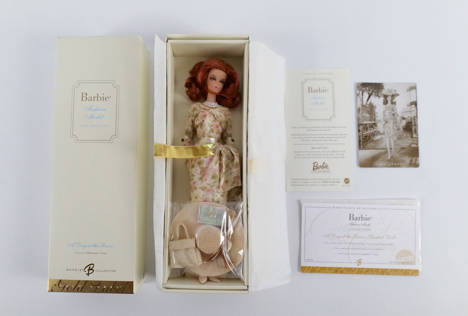 A Day at the Races Silkstone Gold Label Barbie Doll: A Day at the Races Silkstone Gold Label Barbie Doll - Fashion Model Collection. New in Box. All invoices must be paid within 24 hours of the sale. We offer multiple shipping options, please read the s