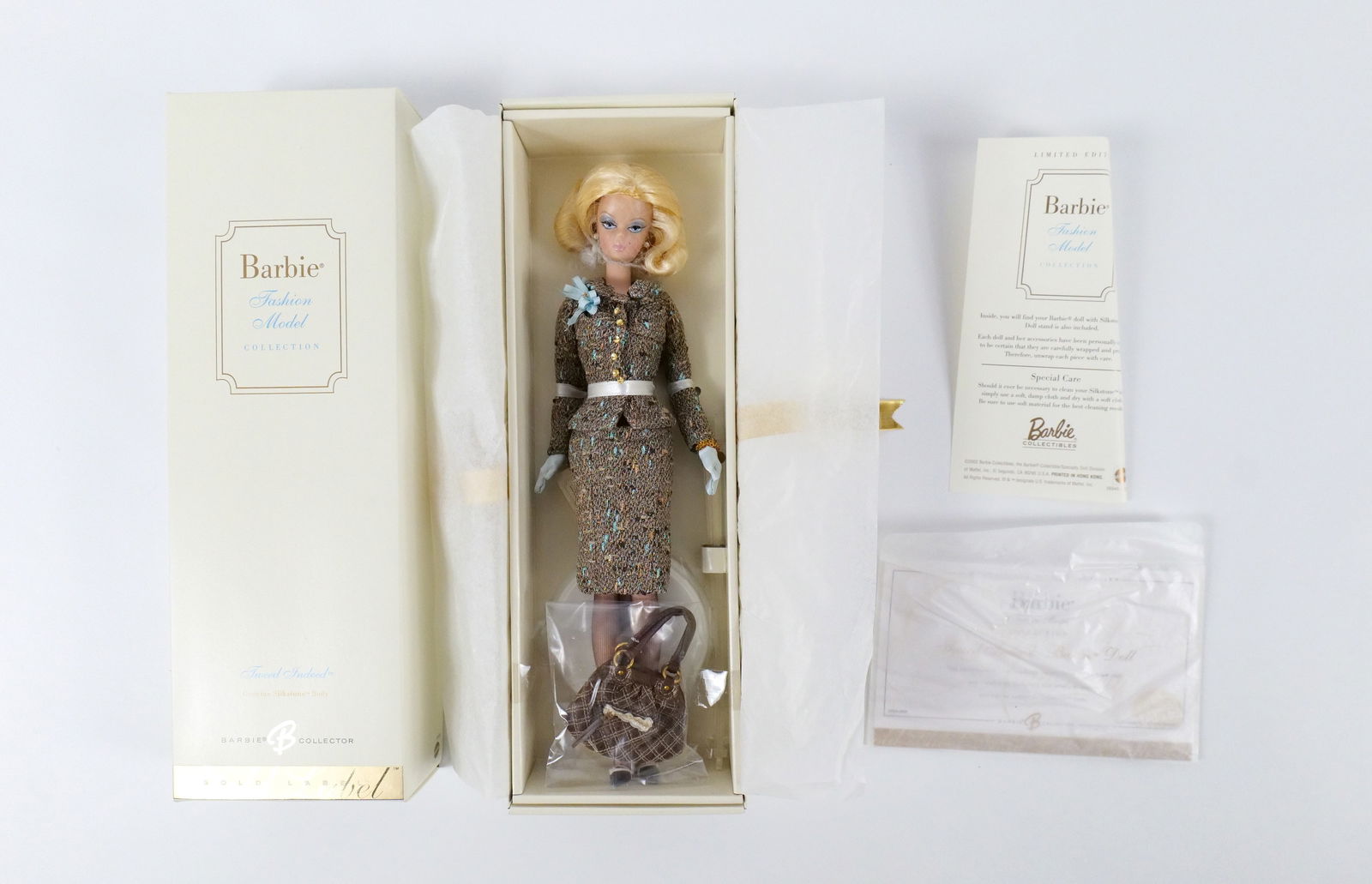 Tweed Indeed Silkstone Gold Label Barbie Doll: Tweed Indeed Silkstone Gold Label Barbie Doll - Fashion Model Collection. New in Box. All invoices must be paid within 24 hours of the sale. We offer multiple shipping options, please read the shippin