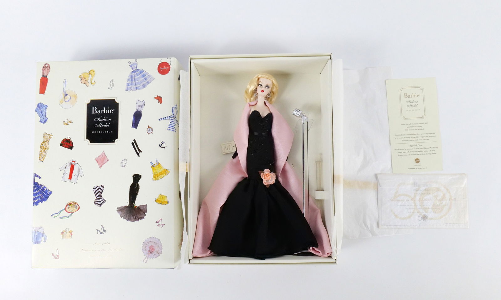 Stunning in the Spotlight Silkstone 50th Anniversary Barbie Doll: Stunning in the Spotlight Silkstone 50th Anniversary Barbie Doll - Fashion Model Collection - Since 1959 - Limited Edition. New in Box. All invoices must be paid within 24 hours of the sale. We offer