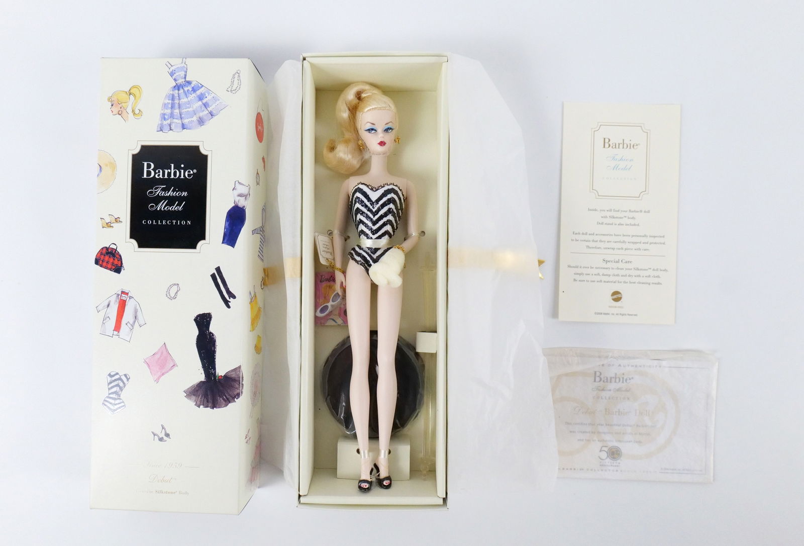 Debut Silkstone 50th Anniversary Barbie Doll - Blonde Version: Debut Silkstone 50th Anniversary Barbie Doll - Fashion Model Collection - Since 1959 - Blonde Hair Version - Limited Edition. New in Box. All invoices must be paid within 24 hours of the sale. We offe