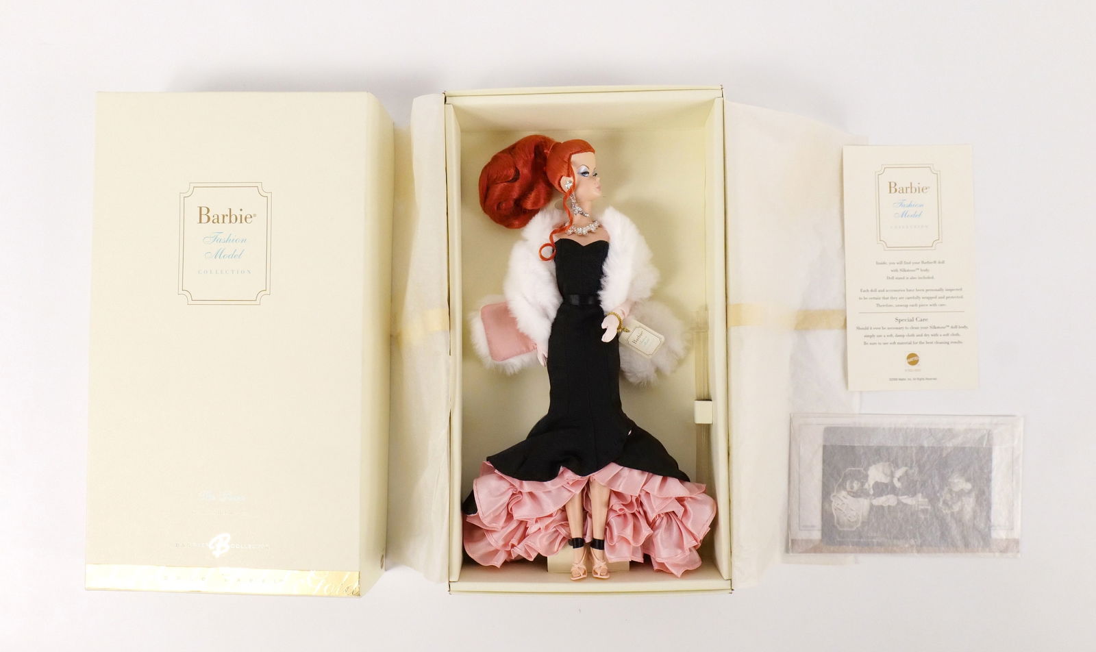 The Siren Silkstone Gold Label Barbie Doll: The Siren Silkstone Gold Label Barbie Doll - Fashion Model Collection. New in Box. All invoices must be paid within 24 hours of the sale. We offer multiple shipping options, please read the shipping t