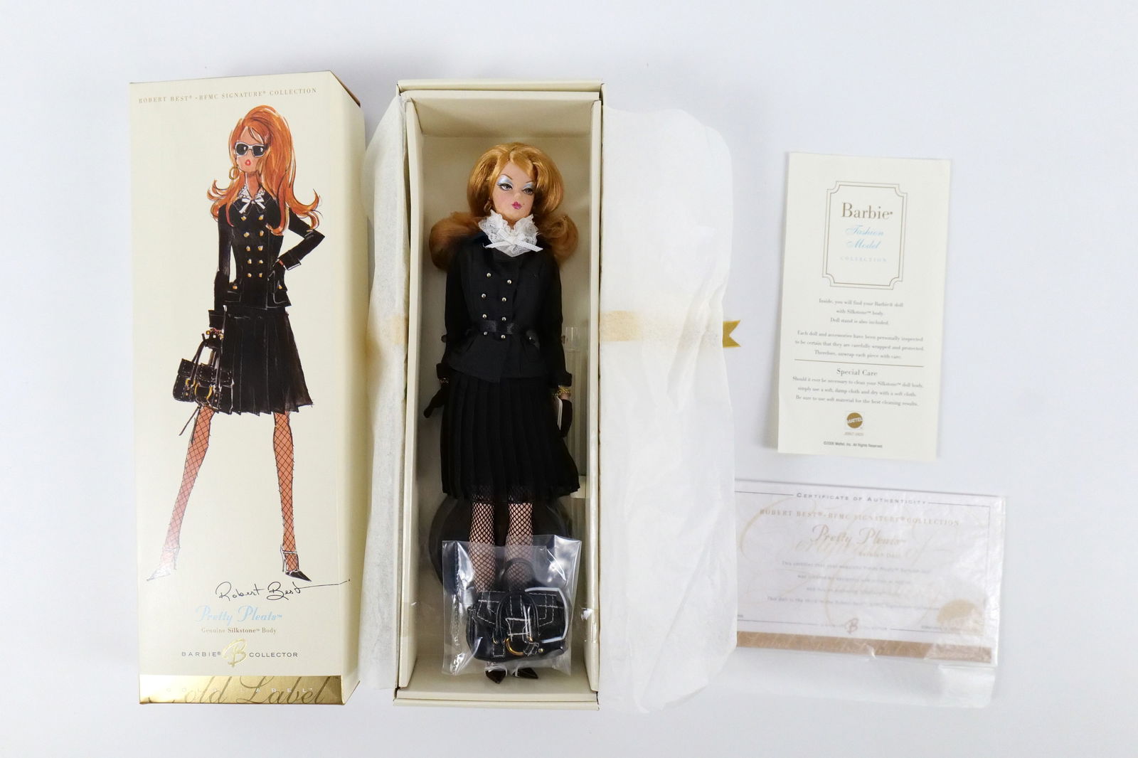 Pretty Pleats Silkstone Gold Label Barbie Doll: Pretty Pleats Silkstone Gold Label Barbie Doll - Fashion Model Collection - Robert Best BFMC Signature Collection. New in Box - Outer Box has some denting. All invoices must be paid within 24 hours of