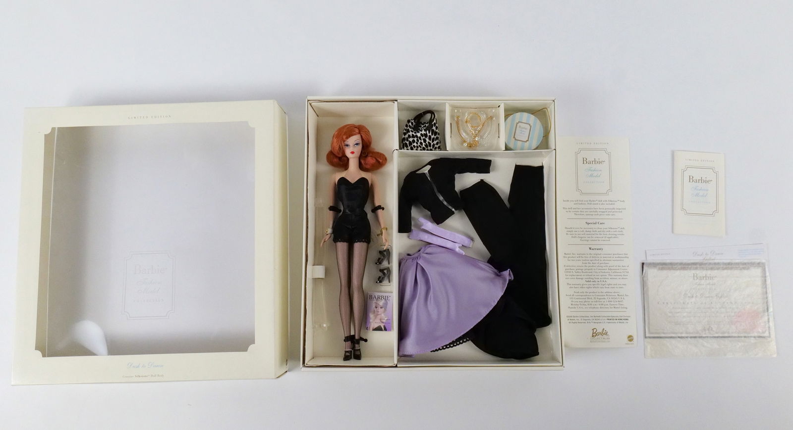 Dusk to Dawn Giftset - Limited Edition Silkstone Barbie Doll with Accessories: Dusk to Dawn Giftset - Limited Edition Silkstone Barbie Doll with Accessories - Fashion Model Collection. New in Box. Bottom edge of box does have minor denting. All invoices must be paid within 24 ho