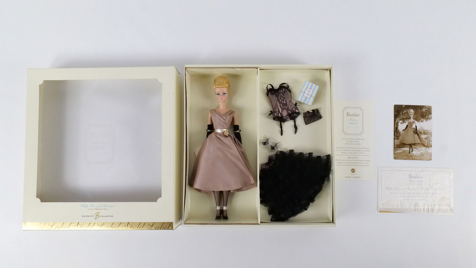 High Tea and Savories Giftset - Gold Label Silkstone Barbie Doll with Accessories: High Tea and Savories Giftset - Gold Label Silkstone Barbie Doll with Accessories - Fashion Model Collection. New in Box. Bottom edge of box does have minor denting. All invoices must be paid within 2