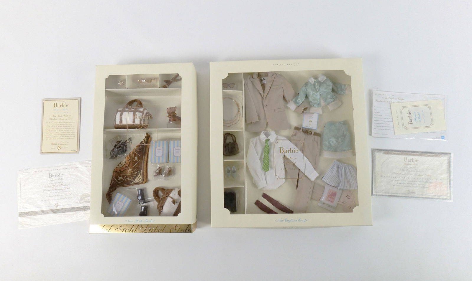 Lot of 2 Barbie Fashion Model Collection Outfits: Lot of 2 Barbie Fashion Model Collection Outfits. Including New York Yorkie - Gold Label and New England Escape Barbie and Ken Limited Edition Giftset. Made especially for the Silkstone Barbie Doll Bo