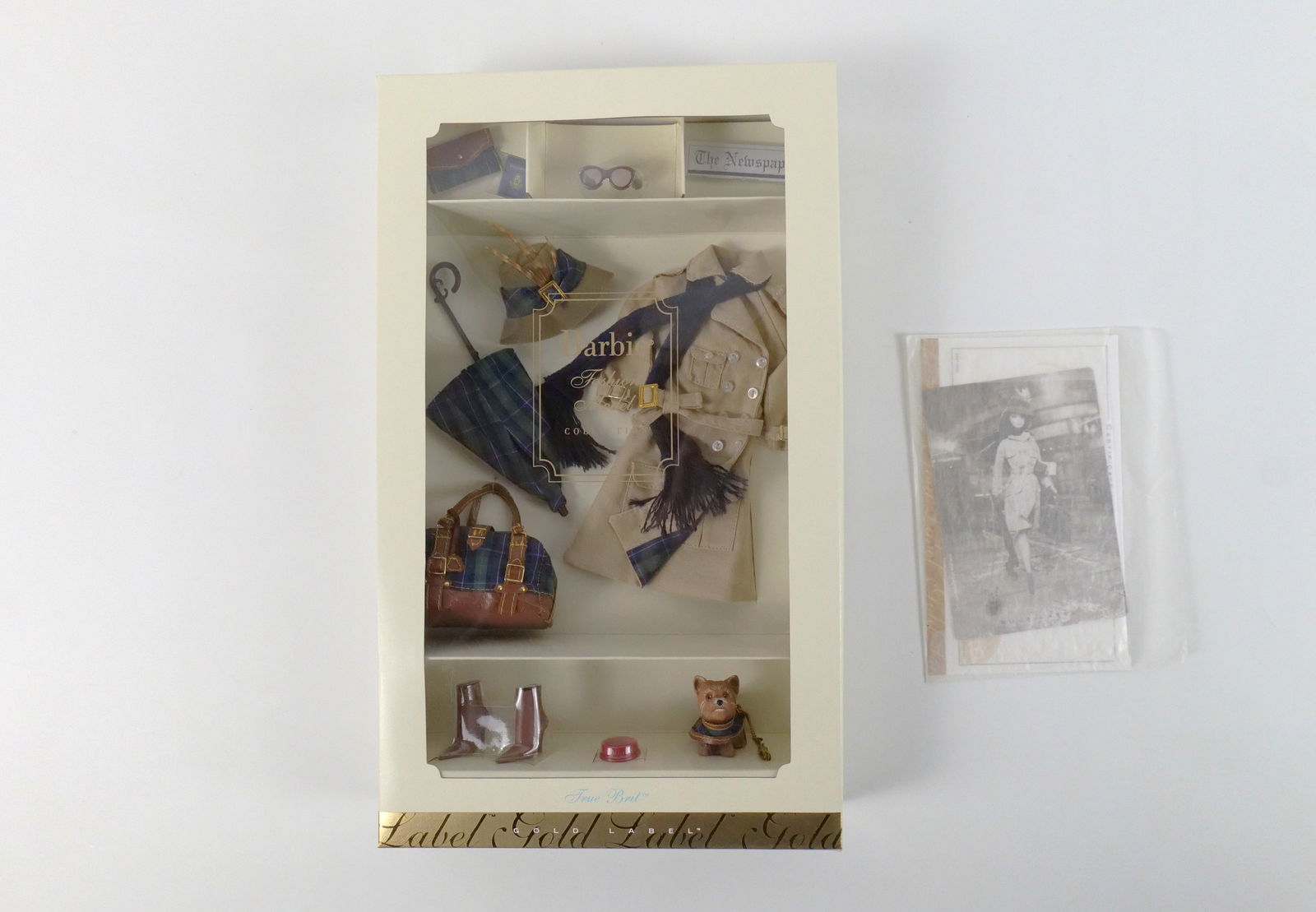 True Brit Barbie Gold Label Accessory Pack: True Brit Barbie Gold Label Accessory Pack - Fashion Model Collection. Made especially for the Silkstone Barbie Doll Body - Not for use with other Barbie's. All invoices must be paid within 24 hours o