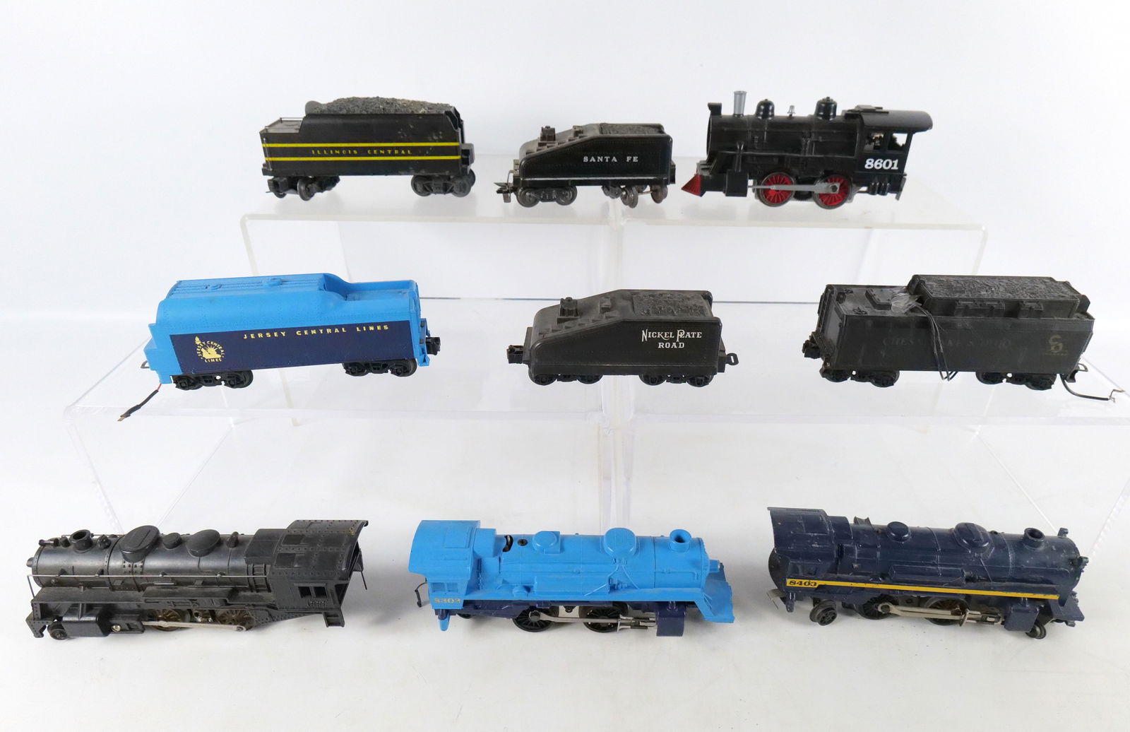 Lot of Lionel Engines and Tenders: Lot of Lionel 027 Gauge Engines and Tenders. Mostly Lionel. Heavily Used. Some AS-IS. Including Jersey Central Lines, C&O, Santa Fe, Illinois Central, and More. All invoices must be paid within 24 hou