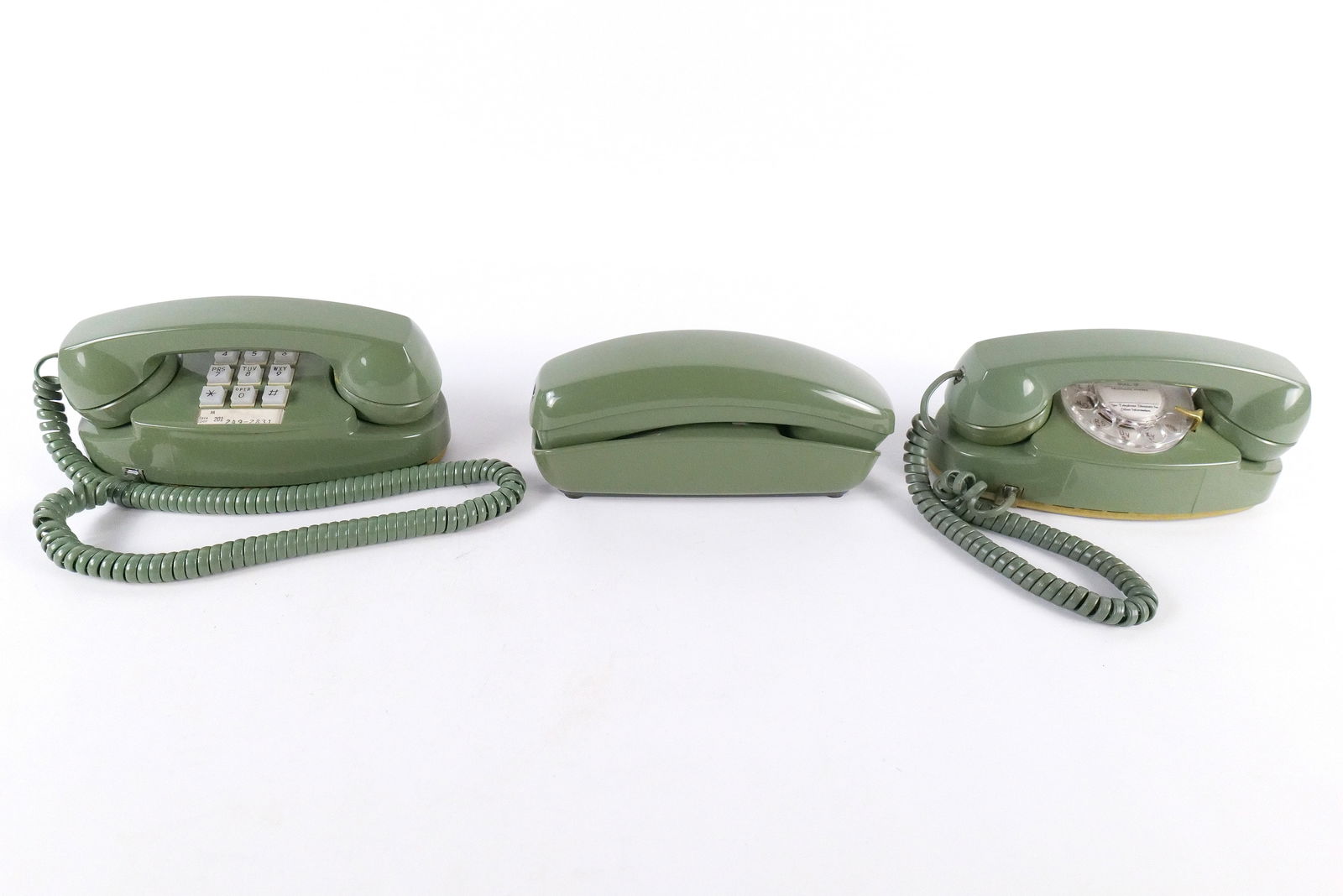 Lot of 3 Vintage Green Western Electric Telephones: Lot of 3 Vintage Green Western Electric Telephones. Including Push Button Princess Telephone, Rotary Princess Telephone and Push Button Wall Hanging Trimline Phone - Missing Cord. All invoices must be