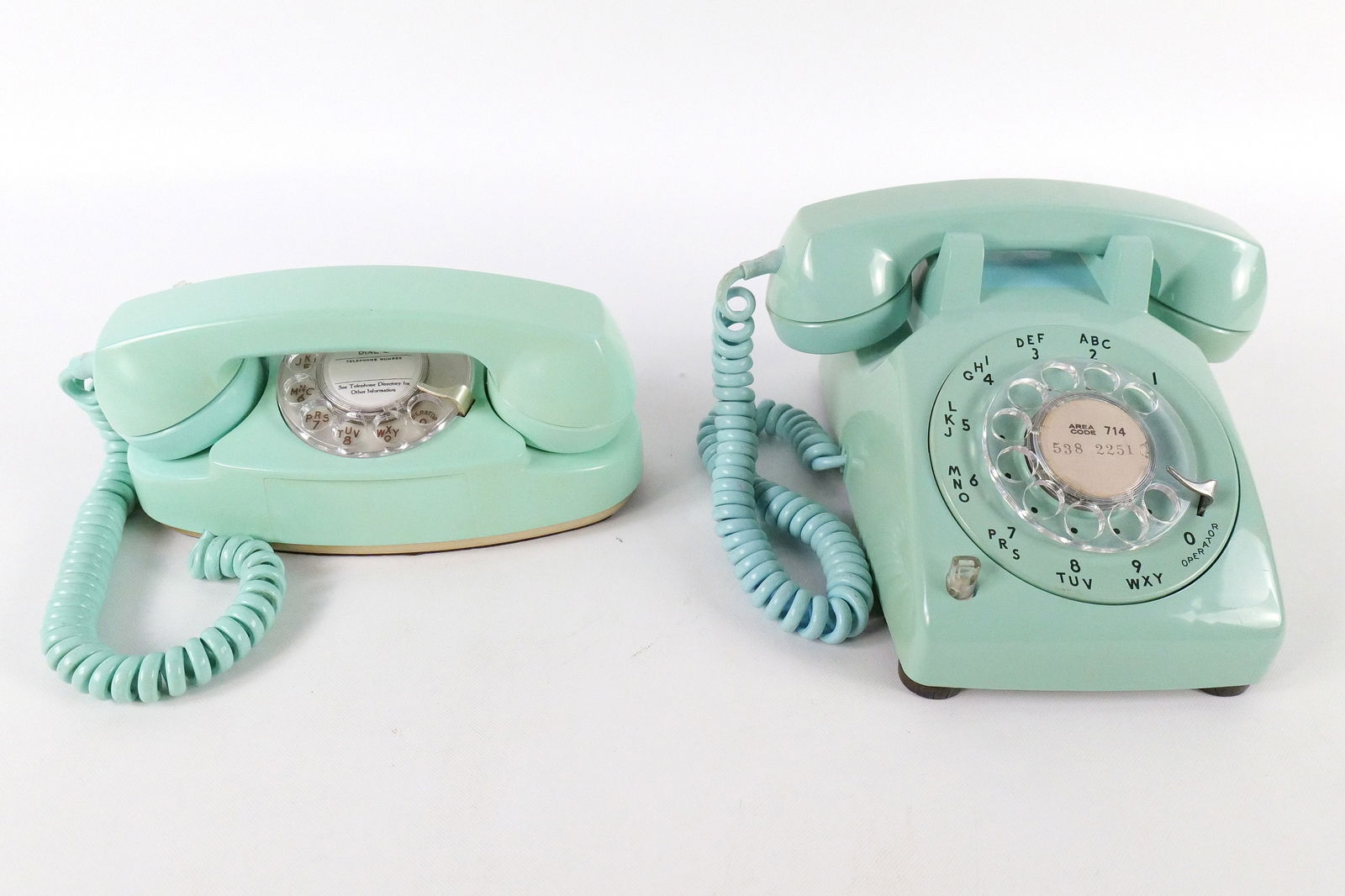 Lot of 2 Vintage Aqua Blue Rotary Telephones: Lot of 2 Vintage Aqua Blue Rotary Telephones. Including Western Electric Desk Phone and Northern Electric (Canada) Princess Phone. Some minor cracking on the princess phone by the holder area. All inv