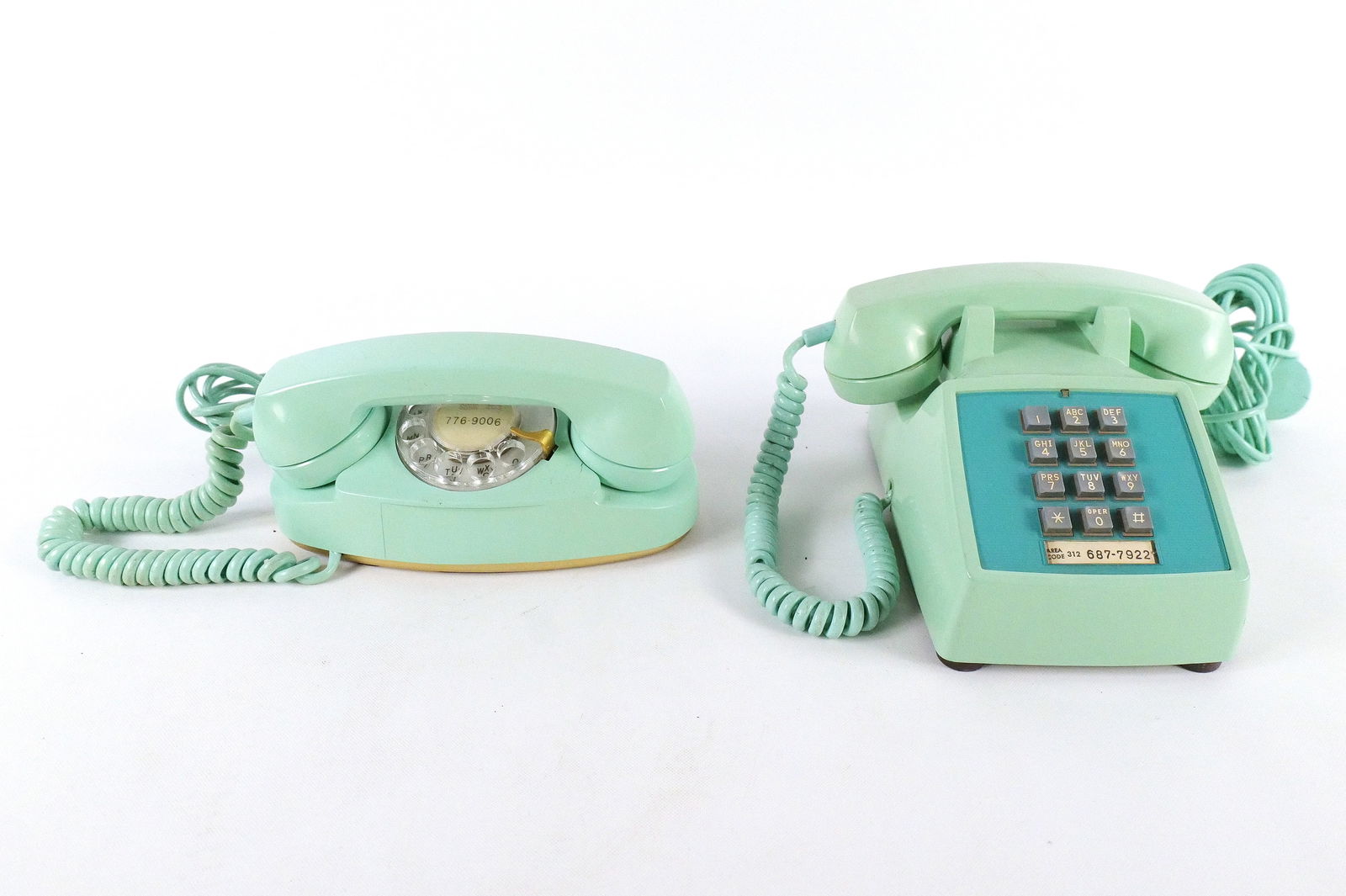 Lot of 2 Vintage Aqua Blue Western Electric Telephones: Lot of 2 Vintage Aqua Blue Western Electric Telephones. Including Rotary Dial Princess Phone and Push Button Desk Telephone. Some discoloration. Looks more like a sea green. Minor cracking on the body