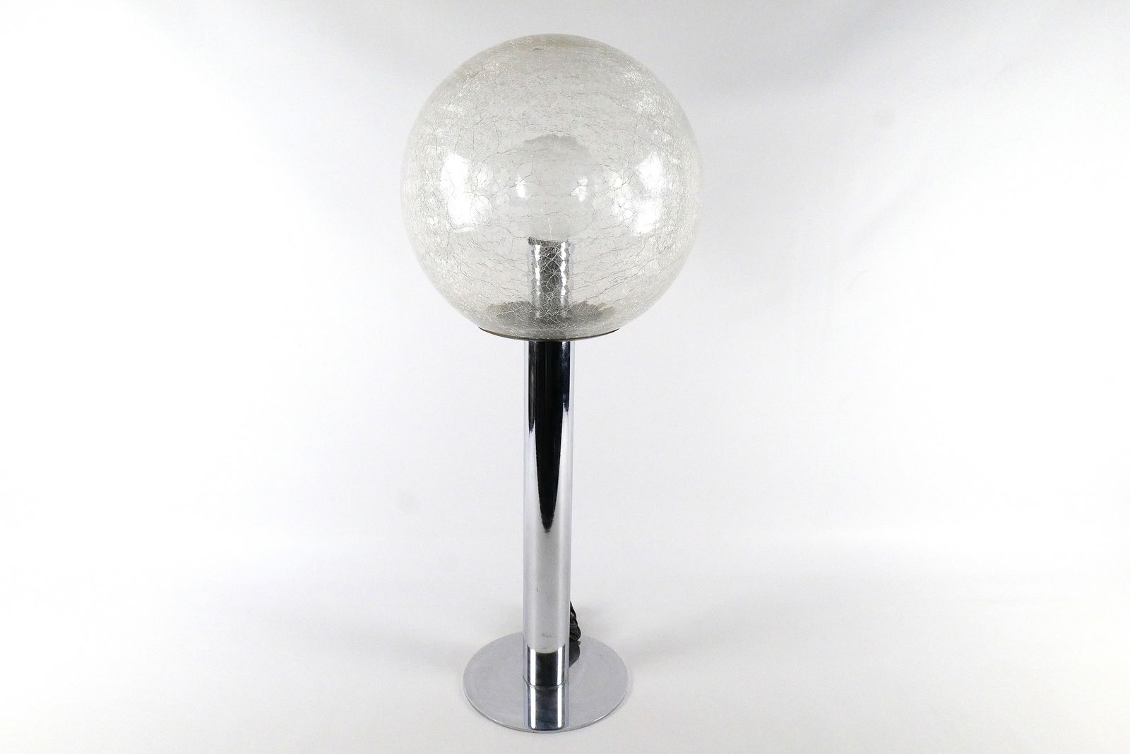 Mid Century Modern Crackle Glass Lamp: Mid Century Modern Lamp - Crackle Glass Shade with Metal Base. Some wear/rust to the metal where the shade goes. The crackle glass shade has chipping on the bottom edge. Overall in good condition. Sha