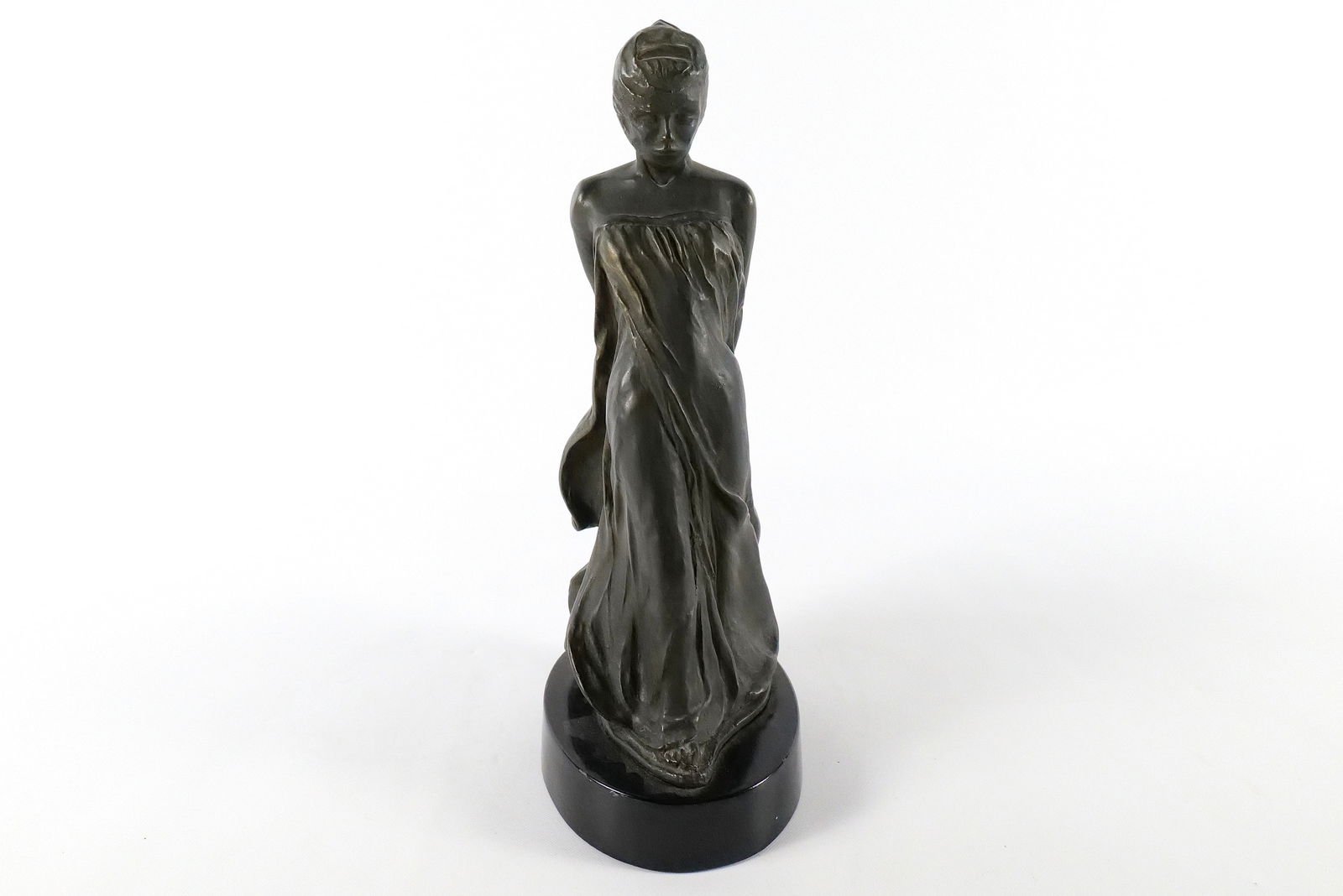 Vintage Art Nouveau Style Figural Sculpture of a Woman: Vintage Art Nouveau Style Figural Sculpture of a Woman. Comes on black lacquer base. Some chipping on edges of base. Measures 13" tall x 7" long. All invoices must be paid within 24 hours of the