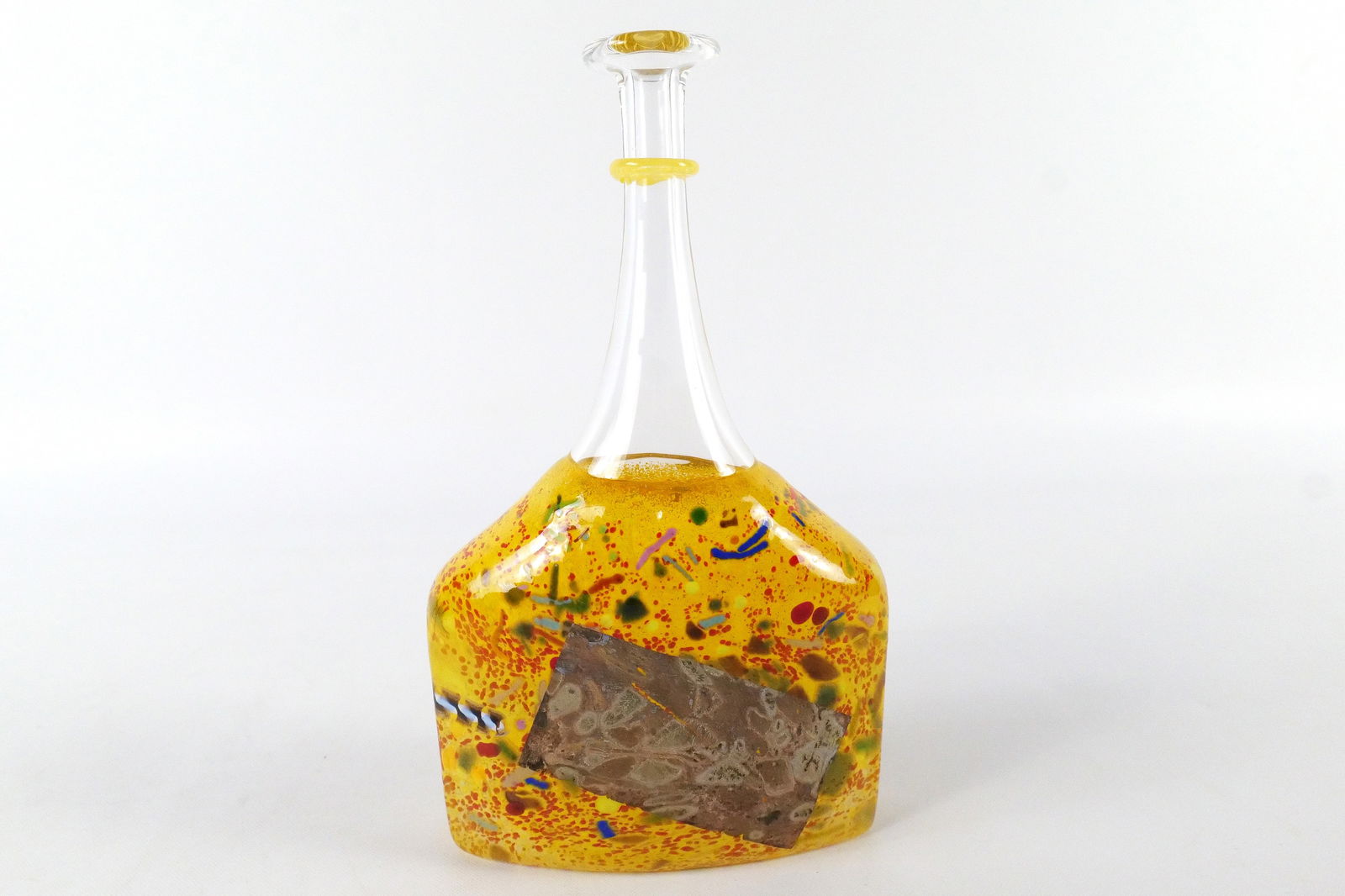 Kosta Boda "Satellite" Art Glass Bottle Vase: Kosta Boda "Satellite" Art Glass Bottle Vase. Signed on the bottom of the vase. Done by artist Bertil Vallien. Measures 9.5" tall x 5.5" wide. All invoices must be paid within 24 hours of the sale.