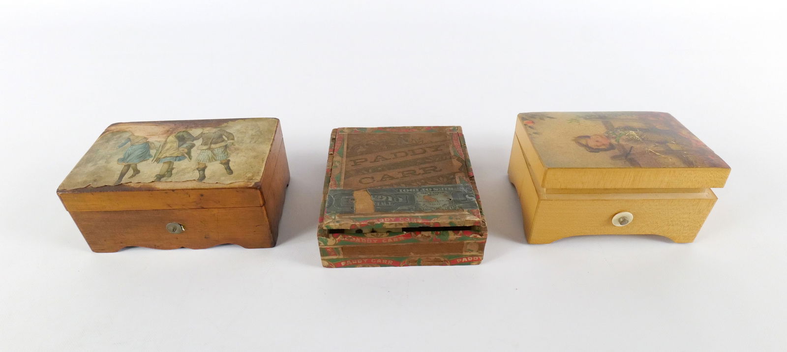 Lot of Vintage Music Boxes and Dominos: Lot of Vintage Music Boxes and Dominos. Music box that has image coming off the top is in working condition. Other not working. All invoices must be paid within 24 hours of the sale. We offer multiple