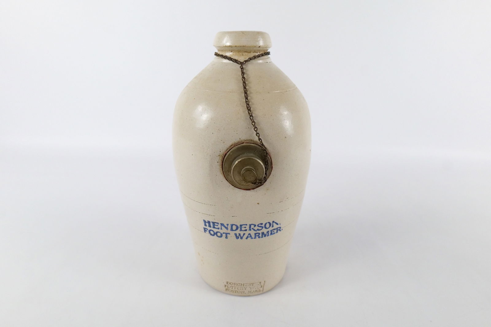 Antique Stoneware Foot Warmer: Antique Stoneware Foot Warmer. Marked Henderson Foot Warmer Dorchester Pottery Wks. Boston Mass. Minor loss on base area. Measures 12" tall x 6.5" wide. All invoices must be paid within 24 hours of th