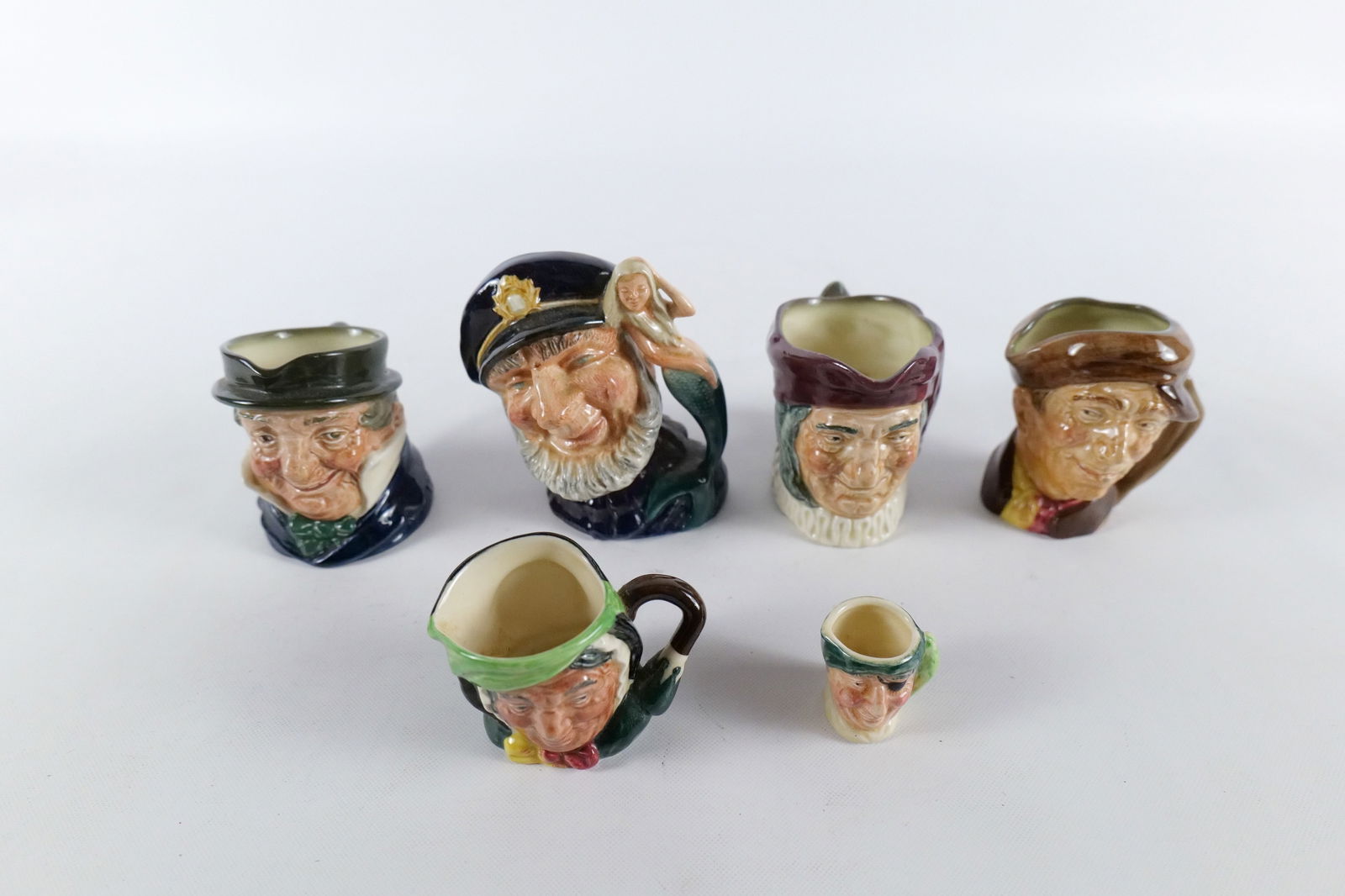 Lot of Royal Doulton Toby Mugs (1 of 9)