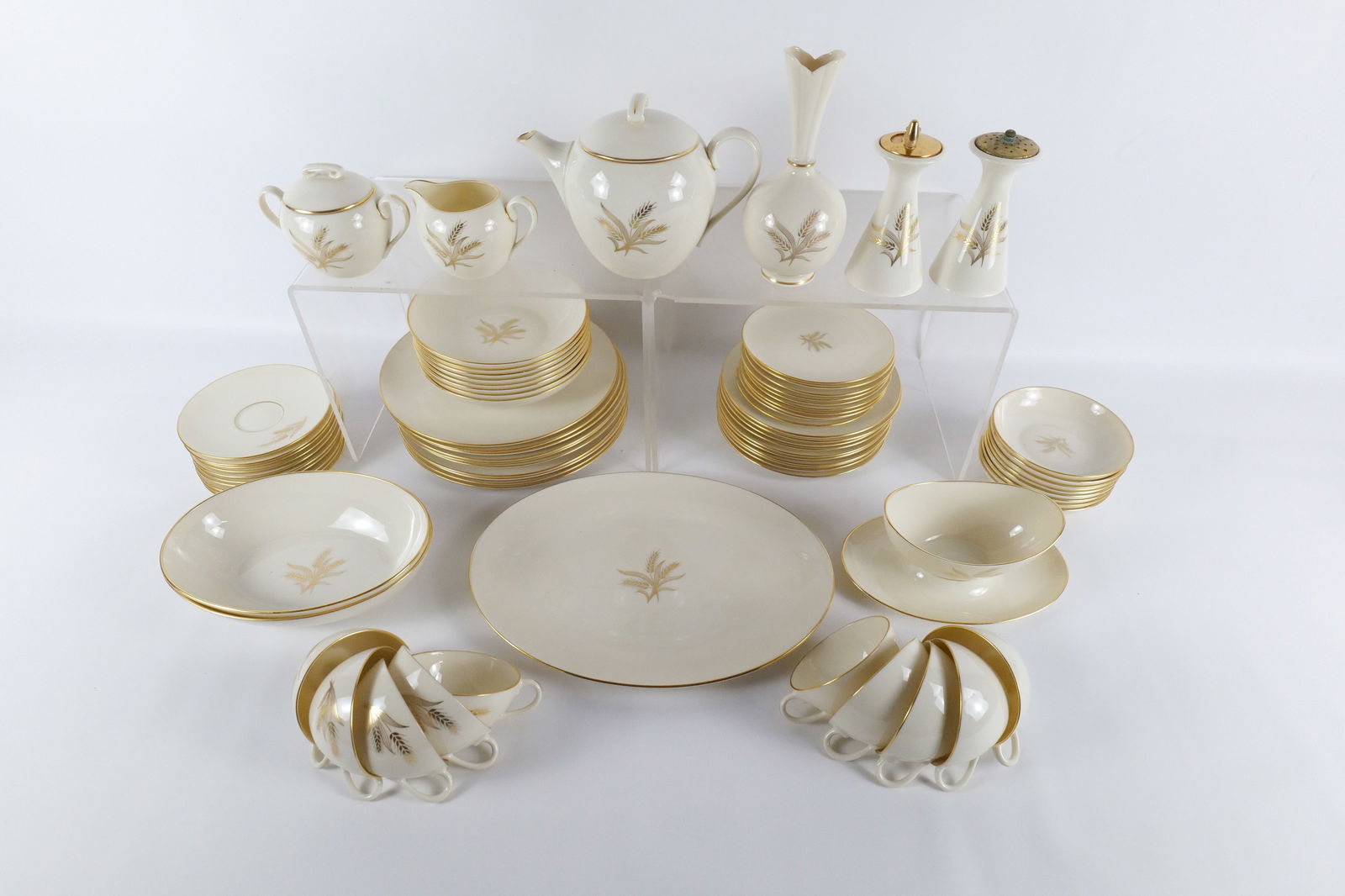 Wheat by Lenox Dinnerware Set - Service for 8 Plus Extras: Wheat by Lenox Dinnerware Set - Service for 8 Plus Extras. Including (10) 10.5" Dinner Plates, (10) Salad Plates, (10) Bread Plates - 1 has Chip, (8) Berry Bowls, (8) Soup Bowls, (10) Cups and Saucers