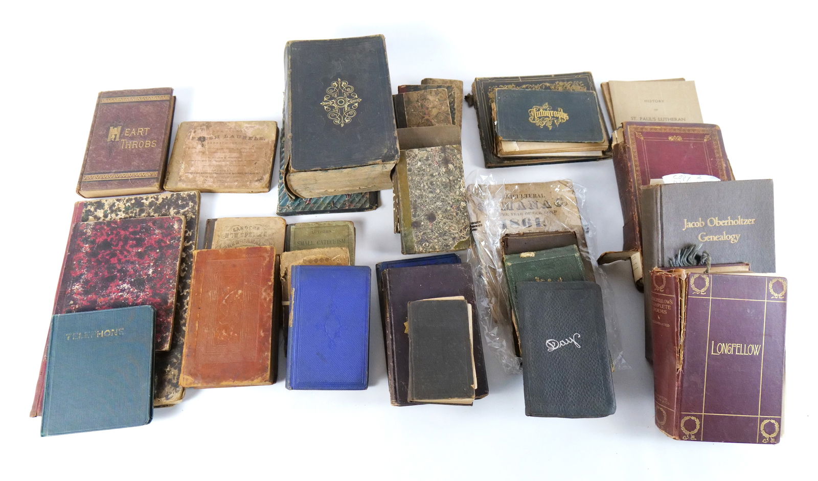Large Lot of Antique Books: Large Lot of Antique Books. Including Poems, Almanac, Autographs, Story of Jack Halyard, Genealogy, Medicinal Books, and More. Most are in poor condition with foxing and some tearing to the pages and