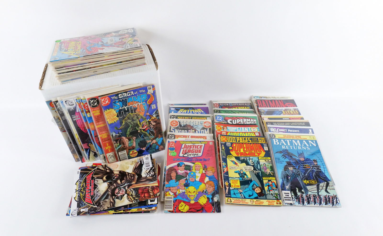 Short Box of DC Comics: Short Box of DC Comics. Including Saga of the Swamp Thing, Green Lantern, Secret Origins, Superman, Batman, and Aquaman. Short Box is approx. 75% Full. Please note that the short boxes in photos do