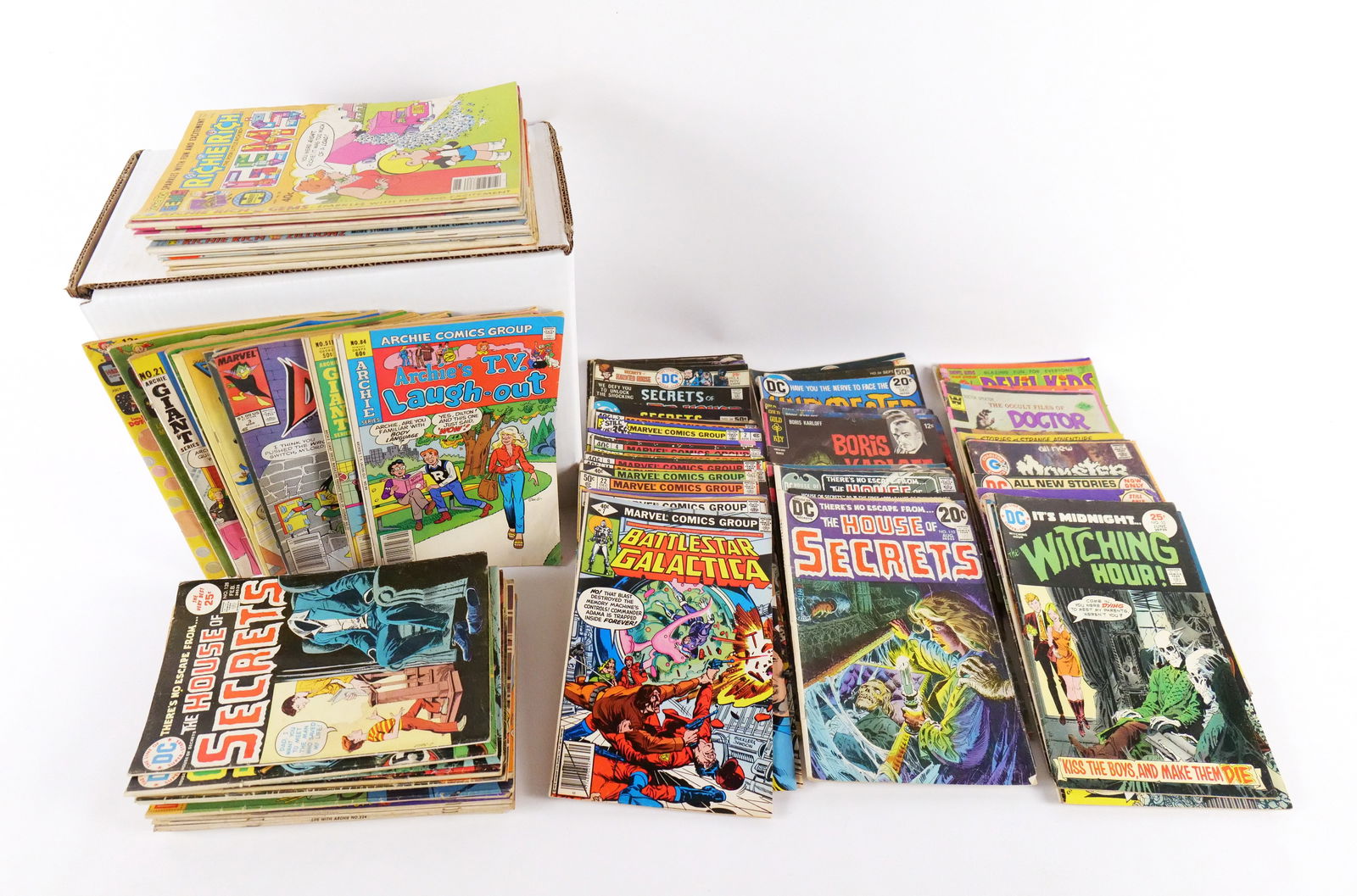 Short Box of Funny and Horror Comics: Short Box of Funny and Horror Comics. Including Archie, House of Secrets, House of Mystery and More. Poor to VG. Short box is approx. 80% Full. Please note that the short boxes in photos do not come w