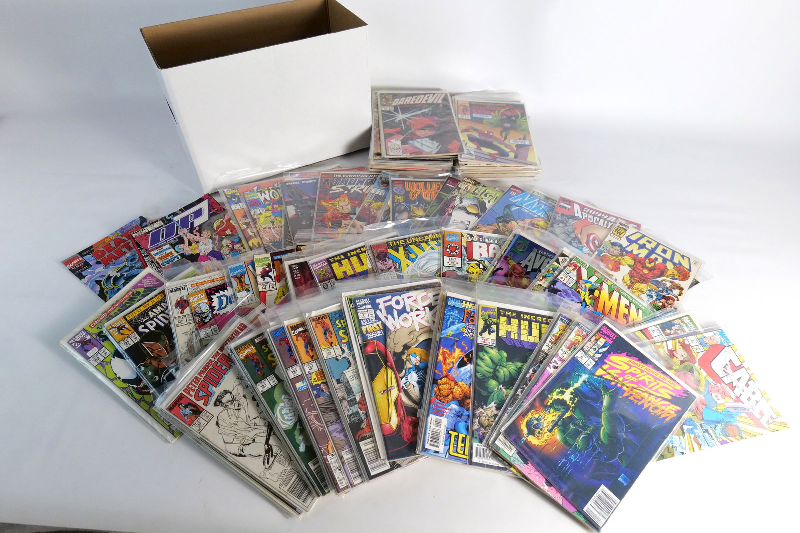 Short Box of Marvel Spidey and Friends: Short Box of Marvel Spidey and Friends. Including Venom, Iron Man, Avengers, Hulk, and Spider-Man Titles. Average Grade is VG+ to Fine. Please note that the short boxes in photos do not come with the