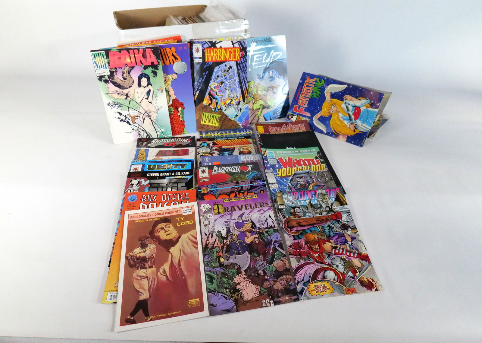 Short Box of Independent Comics: Short Box of Independent Comics. Including The Mask, Youngblood, Blood Shot, Stormwatch, Dinosaurs, and More. Average Grade is VG to VF. Short Box is Full. Please note that the short boxes in photos d