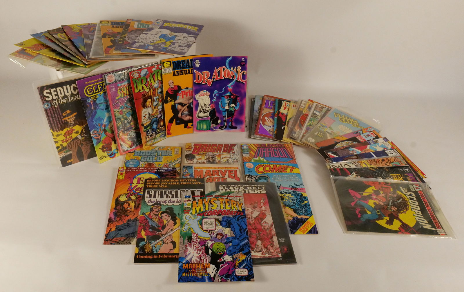 Short Box of Independent Comics: Short Box of Independent Comics. Including Flaming Carrot, Robotech, American Flagg, Miracle Man, and More. Average Grade is VG to VF. Short Box is approx. 85% Full. Please note that the short boxes i